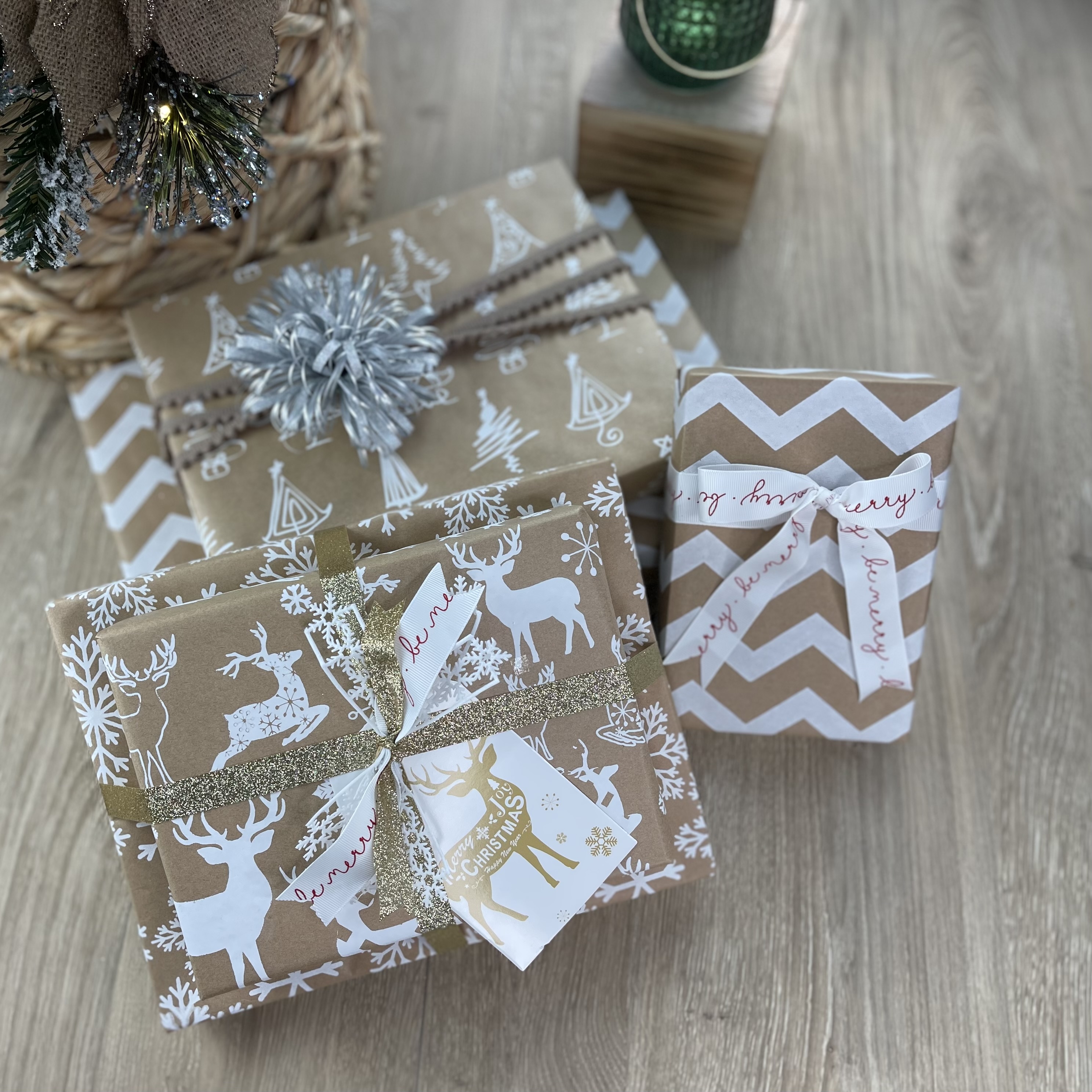 thumbnail video image 2 of LaRibbons 30" x 10' Christmas Wrapping Papre Kit, Kraft with White Trees Snowflakes, 2 of 10