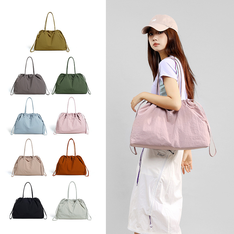 thumbnail video image 2 of SPEKSEE Women Drawstring Nylon Tote Bag, Large Capacity Lightweight Shoulder Handbag, Water Resistant Casual Gym Bag, Convertible Drawstring Closure Shopper Tote for Everyday Use, 2 of 7