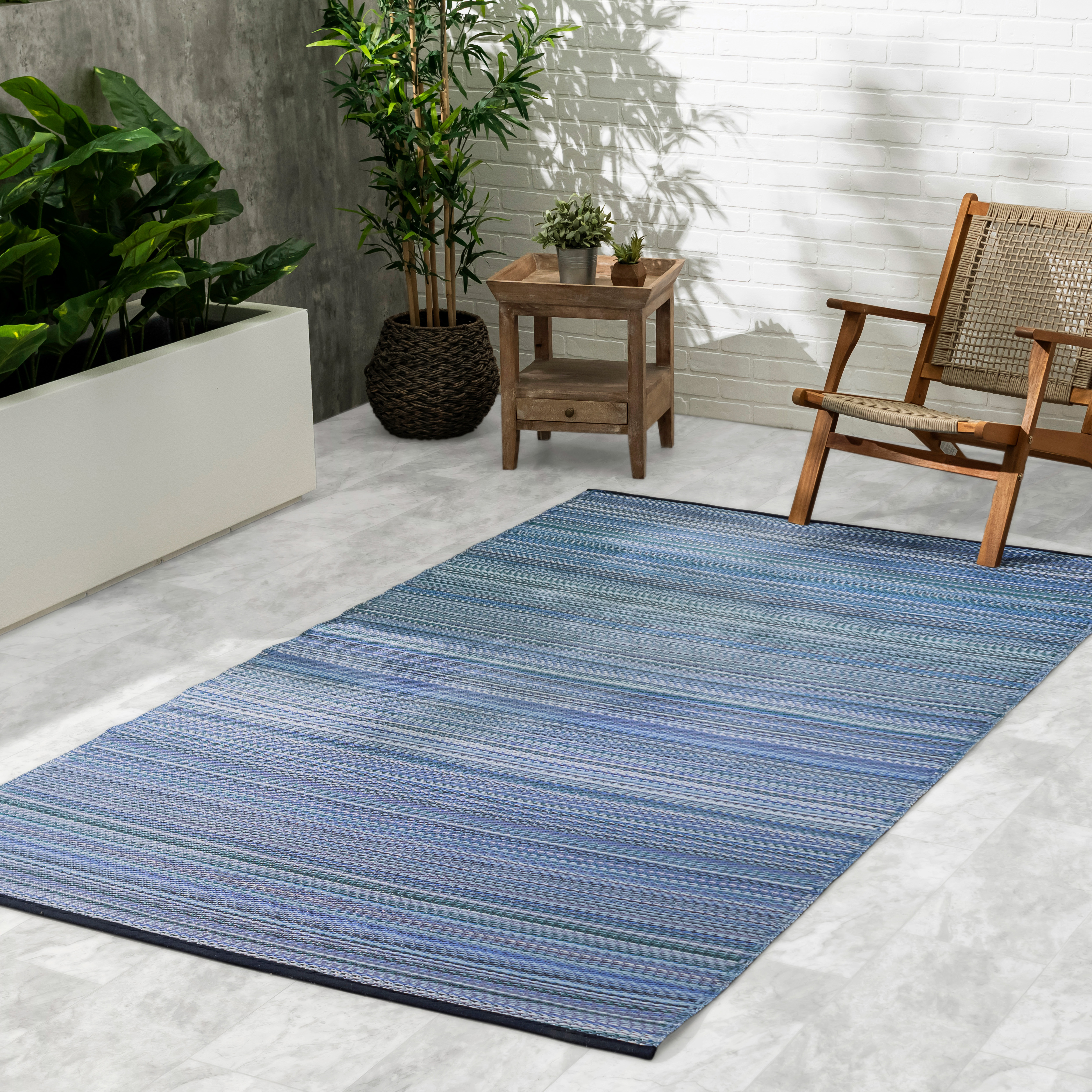 thumbnail video image 2 of Fab Habitat Striped Outdoor Rug - Waterproof, Fade Resistant, Crease-Free, Reversible - Premium Recycled Plastic - Patio Porch Balcony Deck - Cancun Indigo - 8x10 ft, 2 of 9