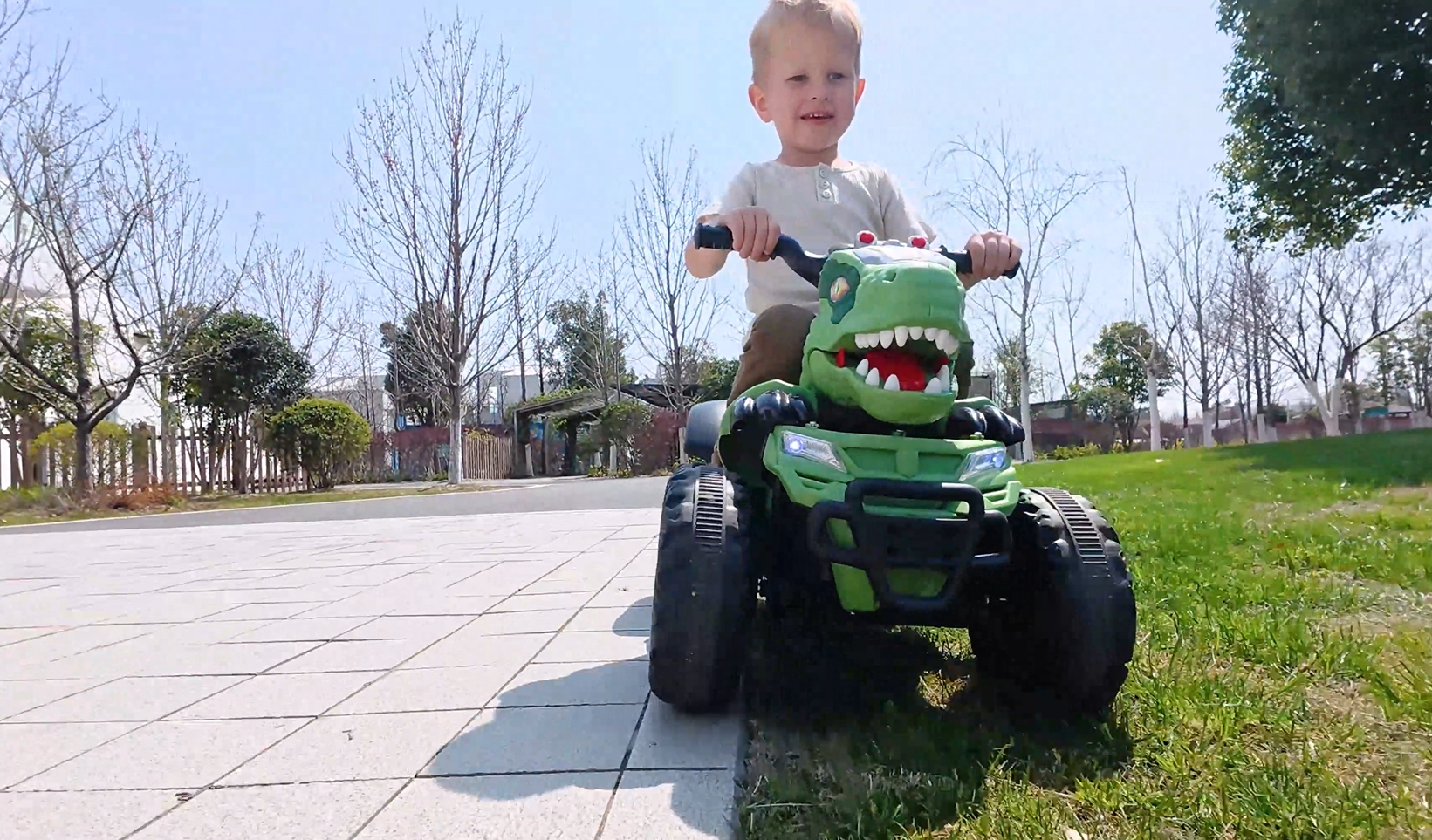 thumbnail video image 2 of Track Seven 12V Electric Ride-On ATV, Dinosaur Four Wheeler Electric Car with Bluetooth, LED Lights, Music, Electric Quad Ride-On Toy Car for Toddlers Boys Girls Age 2+, Green, 2 of 8