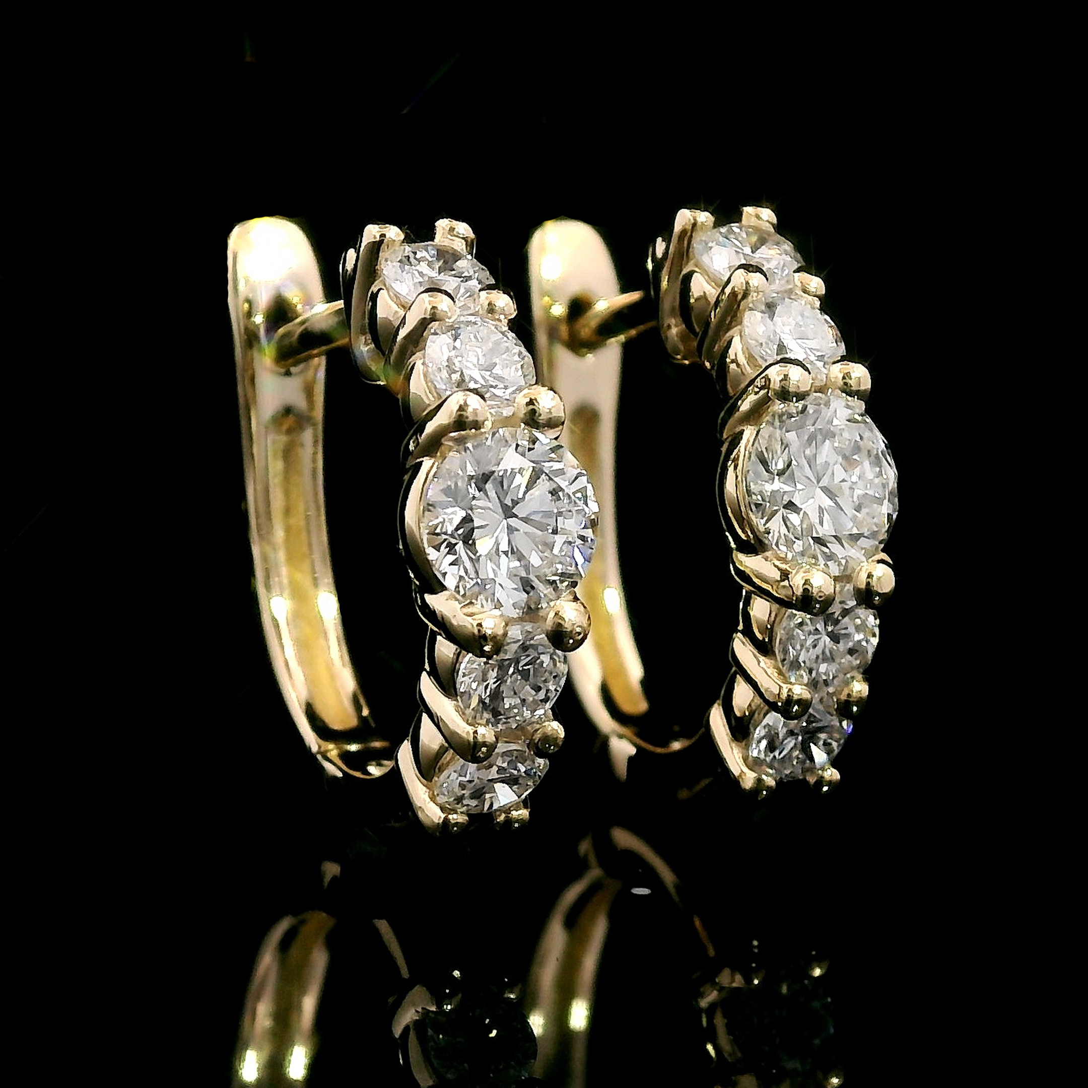 thumbnail video image 2 of Gem Stone King 10K Yellow Gold Red Ruby and Lab Grown Diamond Hoop Earrings for Women | 1.22 Cttw | Gemstone July Birthstone | Round 4MM, 2 of 7