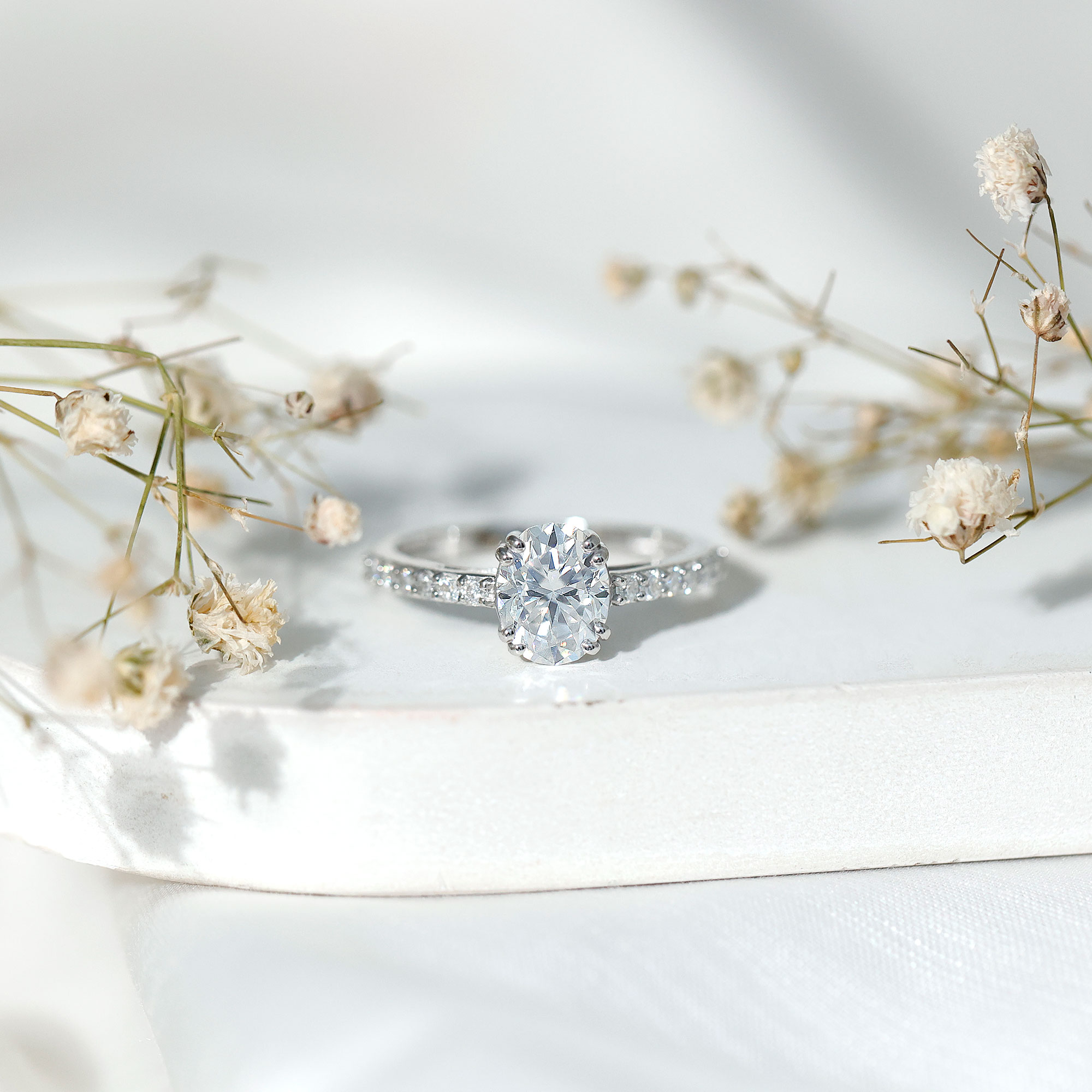 thumbnail video image 2 of Rosec Jewels Sterling Silver Oval Moissanite Ring (7x9 mm, D-VS1 Quality) - 2 Carat Engagement Ring with Side Stones, US 7.00, 2 of 7