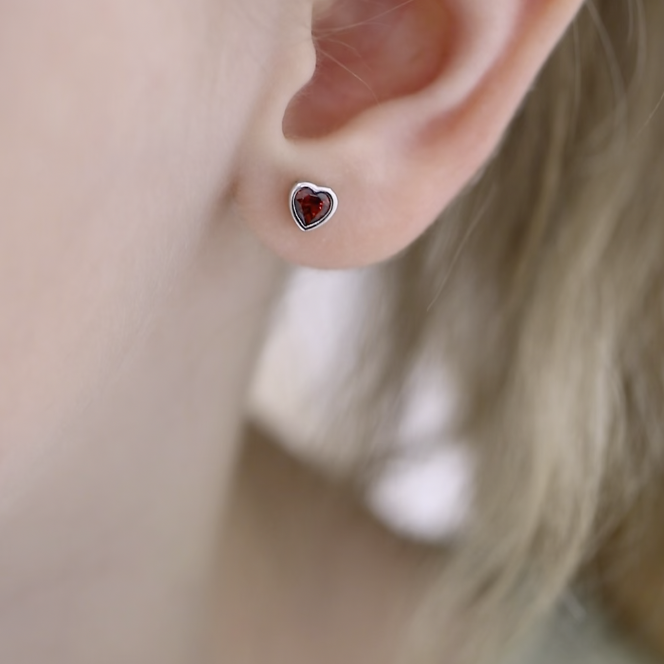 thumbnail video image 2 of 925 Sterling Silver Simulated Blue Topaz Birthstone Heart Screw Back Earrings, 2 of 8