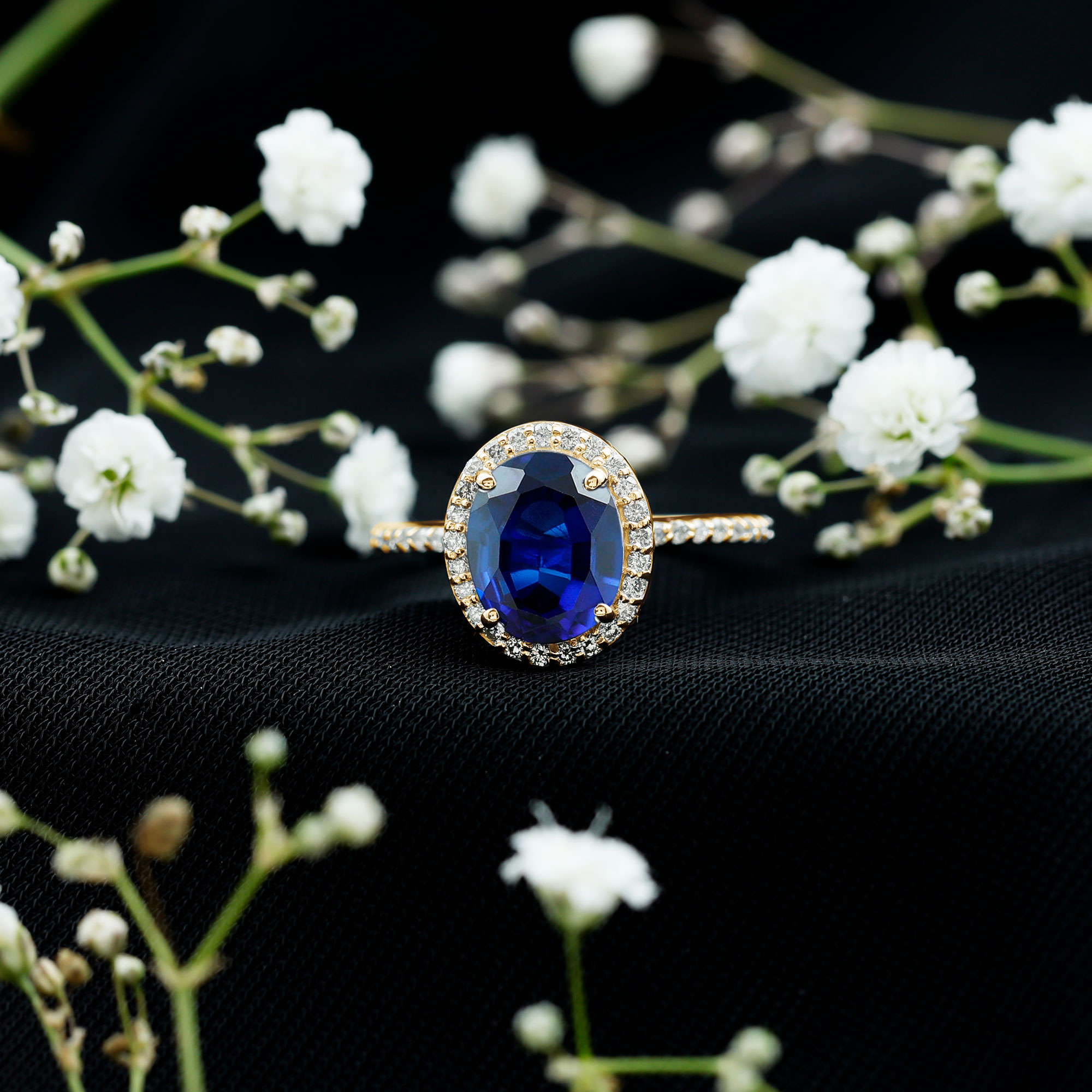 thumbnail video image 2 of Rosec Jewels Oval Lab Created Blue Sapphire Ring with Diamond Halo - AAAA Grade, 18K White Gold, US 4.50, 2 of 8