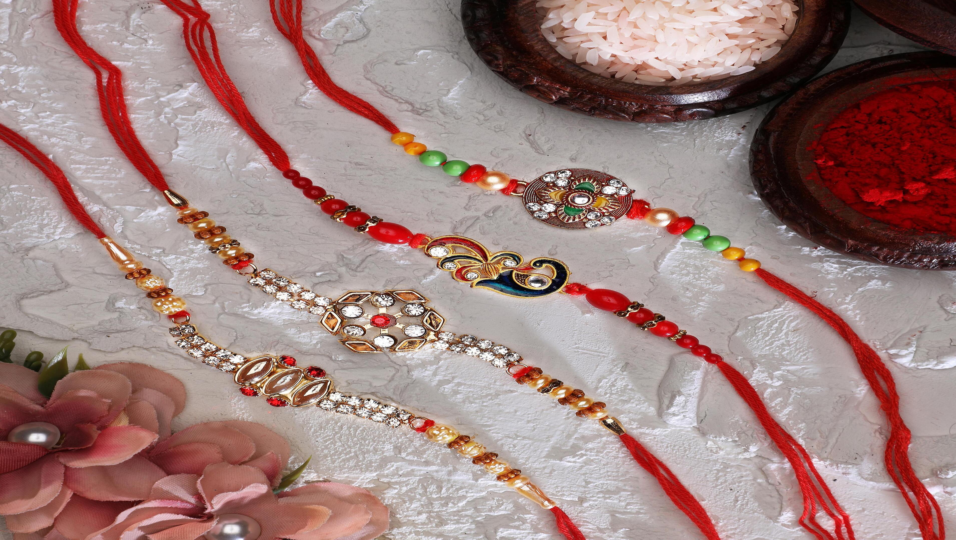 thumbnail video image 2 of Set of 4 Rakhi for Brother Rakhi Thread for Bhai Bhabhi Bhaiya and Bhatiji veera Raksha Bandhan Rakhi Set Dora Bracelet Kalwa with gift Pack in Red Bag for Brother Sister Indian Traditional Festival, 2 of 7