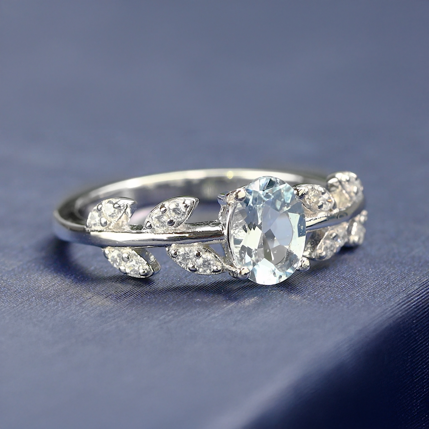thumbnail video image 2 of Gem Stone King 18K Yellow Gold Plated Silver Sky Blue Aquamarine Greek Olive Vine Branch Engagement Ring for Women (0.96 Cttw, Oval 7X5MM, Gemstone Birthstone, Available in Size 5, 6, 7, 8, 9), 2 of 7