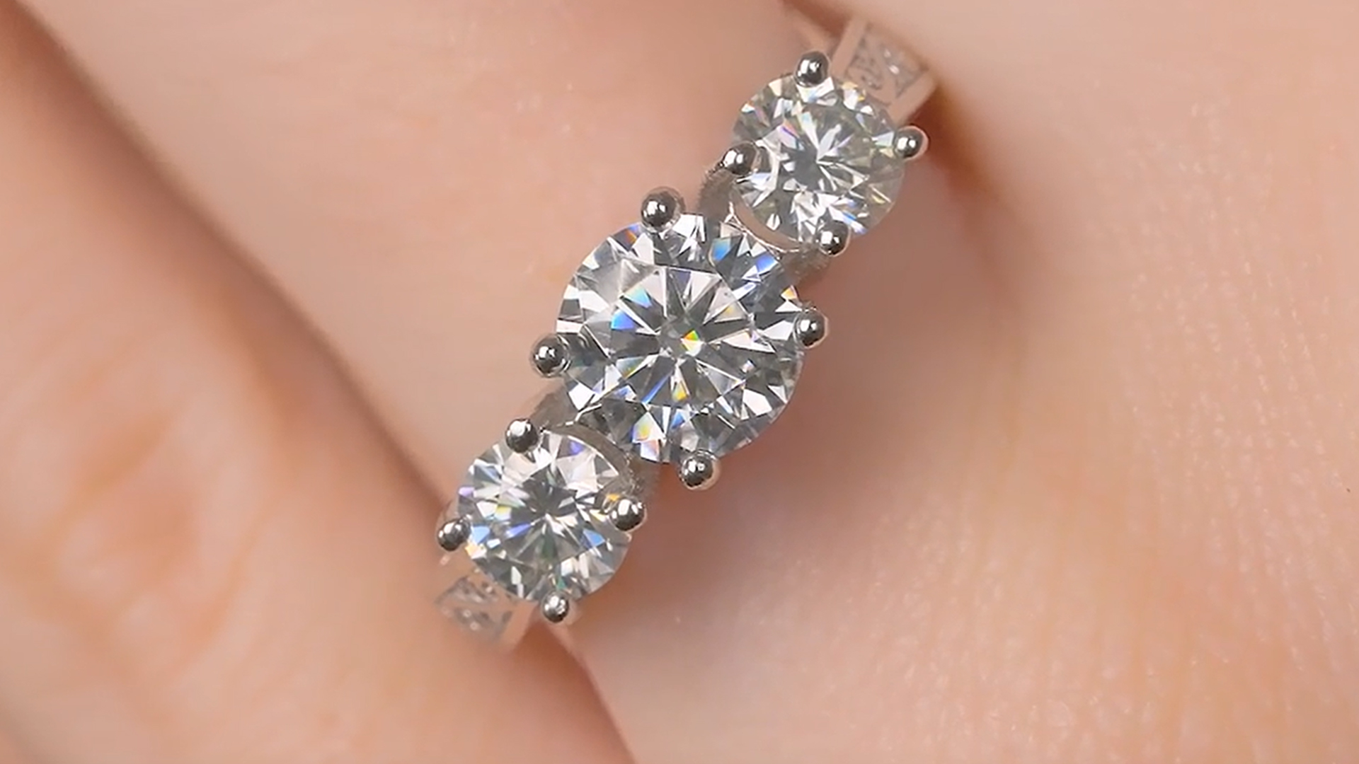 thumbnail video image 2 of Gem Stone King 925 Sterling Silver White Topaz 3-Stone Women's Ring (2.40 Ct Round, Available 5,6,7,8,9), 2 of 5