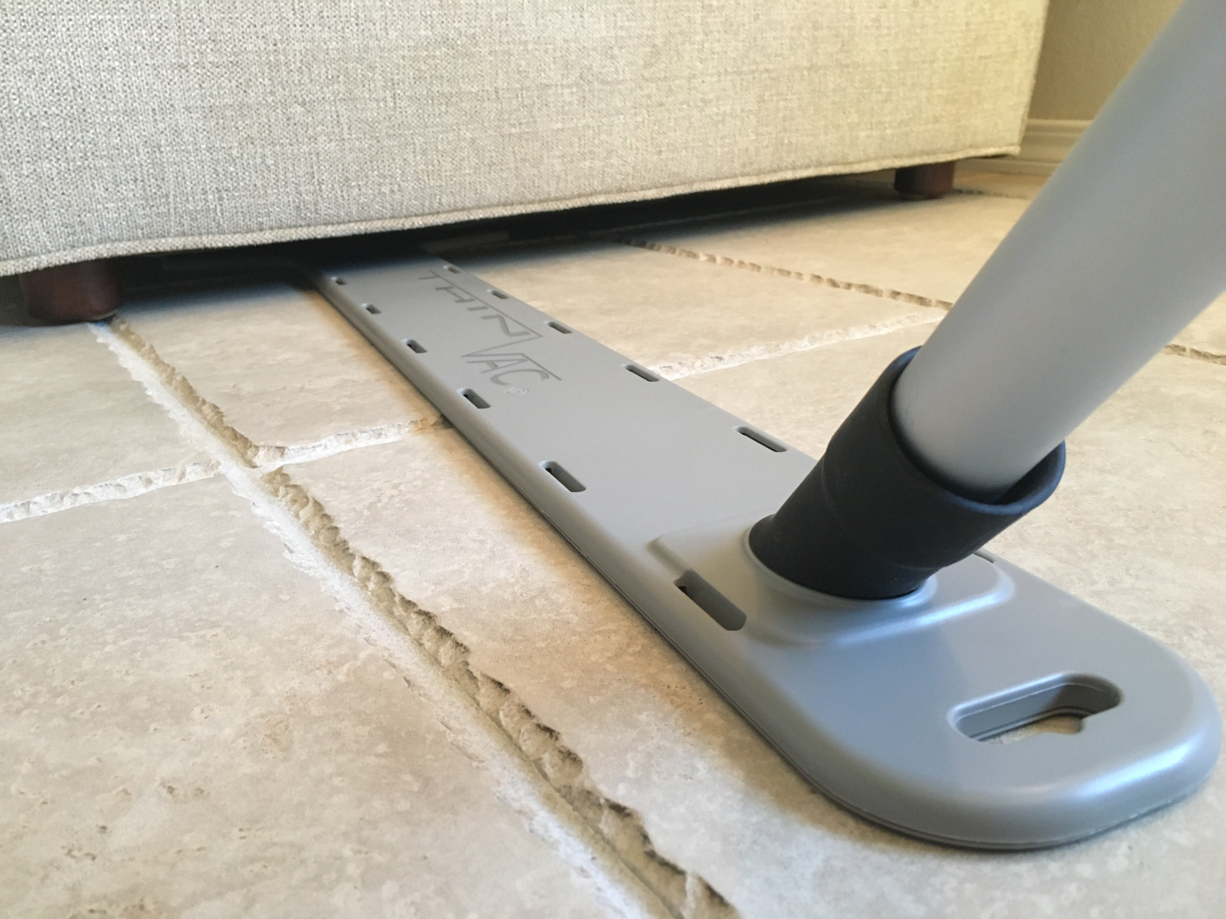 thumbnail video image 2 of Thin Vac® Vacuum Attachment to clean under Refrigerator, Appliances & furniture, fits standard 1 1/4 to 1 3/8 inch hose wands, no more kneeling or bending down. MADE IN U.S.A,, 2 of 6