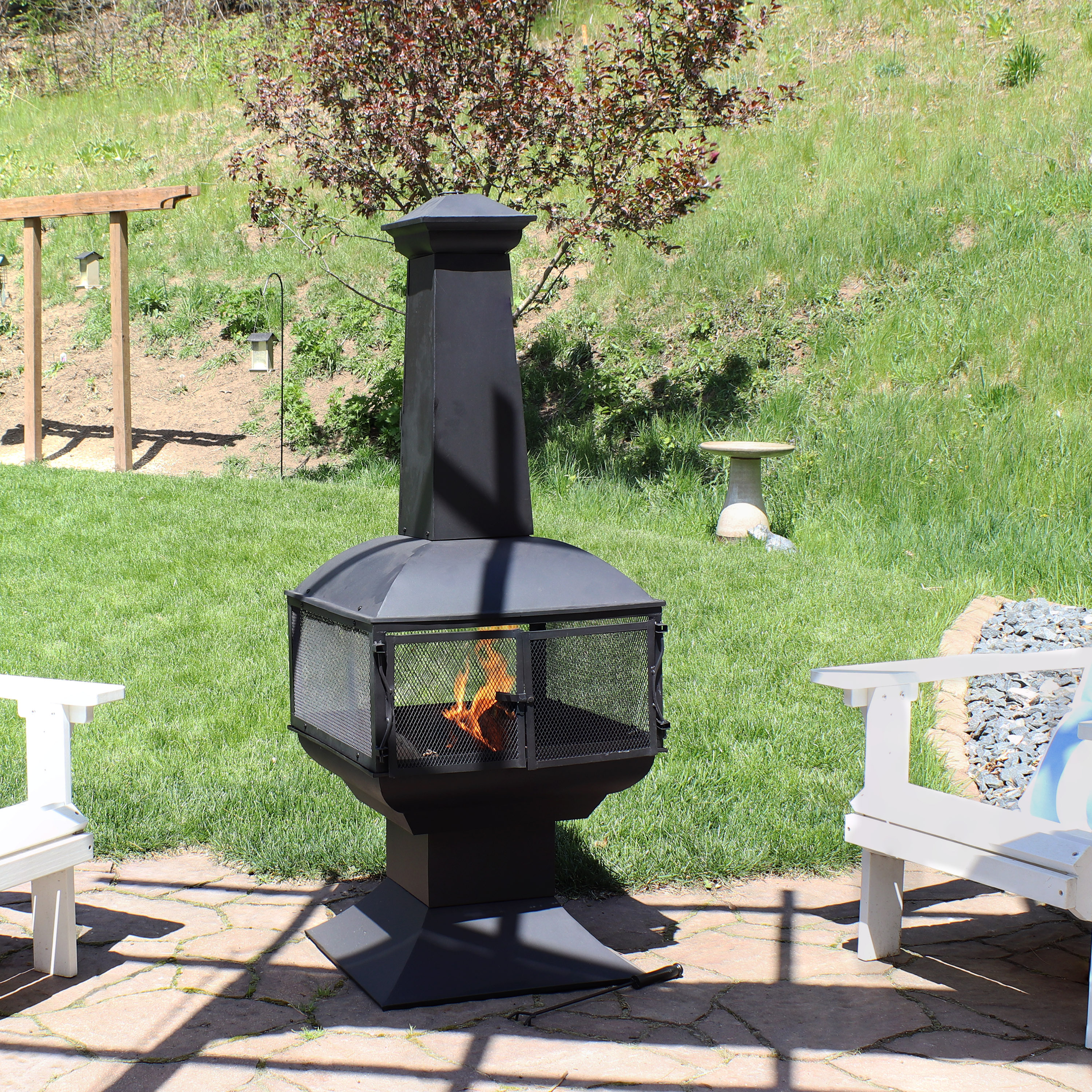thumbnail video image 2 of Sunnydaze 57" 360-Degree View Steel Wood-Burning Chiminea with Grate, Poker, and Cover, 2 of 9