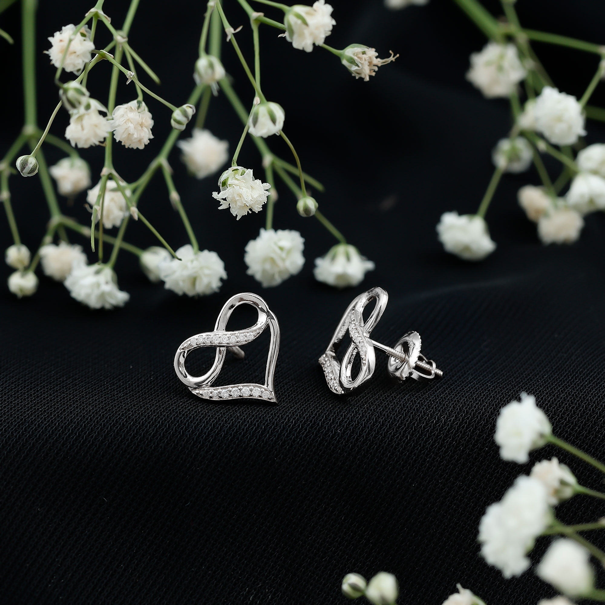 thumbnail video image 2 of Rosec Jewels Moissanite Heart Stud Earrings - Heart Infinity Earrings for Women - D-VS1 Grade - Ready to Gift for Valentines, 925 Sterling Silver, 2 of 7