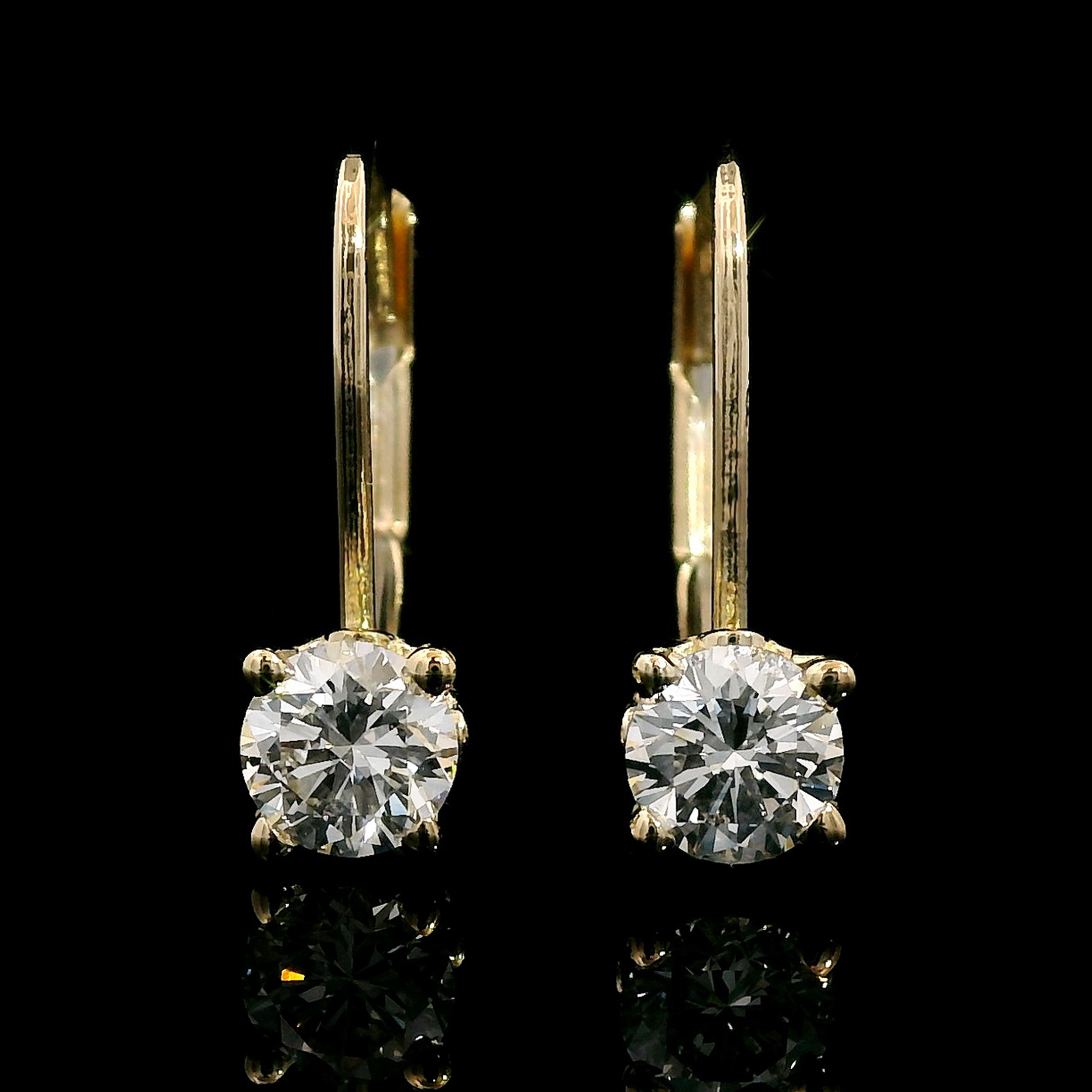 thumbnail video image 2 of Gem Stone King 14K Yellow Gold Persian Blue Moissanite and Dangle Earrings for Women | 0.46 Cttw | Gemstone Birthstone | Round 4MM, 2 of 7