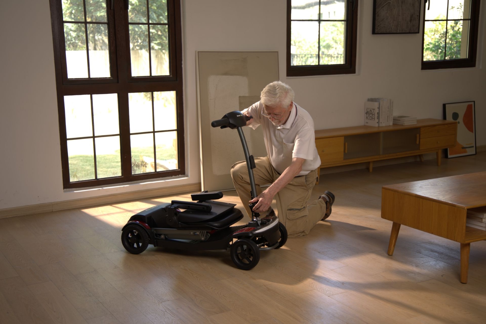 thumbnail video image 2 of ScootNGo 4-Wheel Foldable Mobility Scooter for Seniors - 44lbs Ultra Lightweight, Airline Approved, with USB Port & Removable Battery, 2 of 13