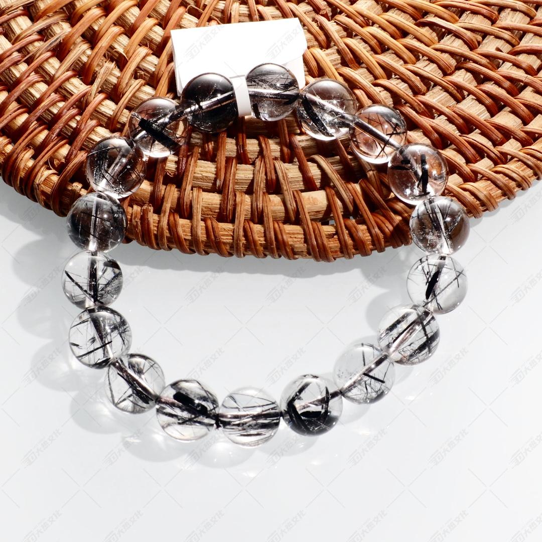 thumbnail video image 2 of Flyshop Jewelry Natural Black Rutilated Quartz Crystal Bracelet, Coarse Hair (Bead Dia. 13mm), 2 of 7
