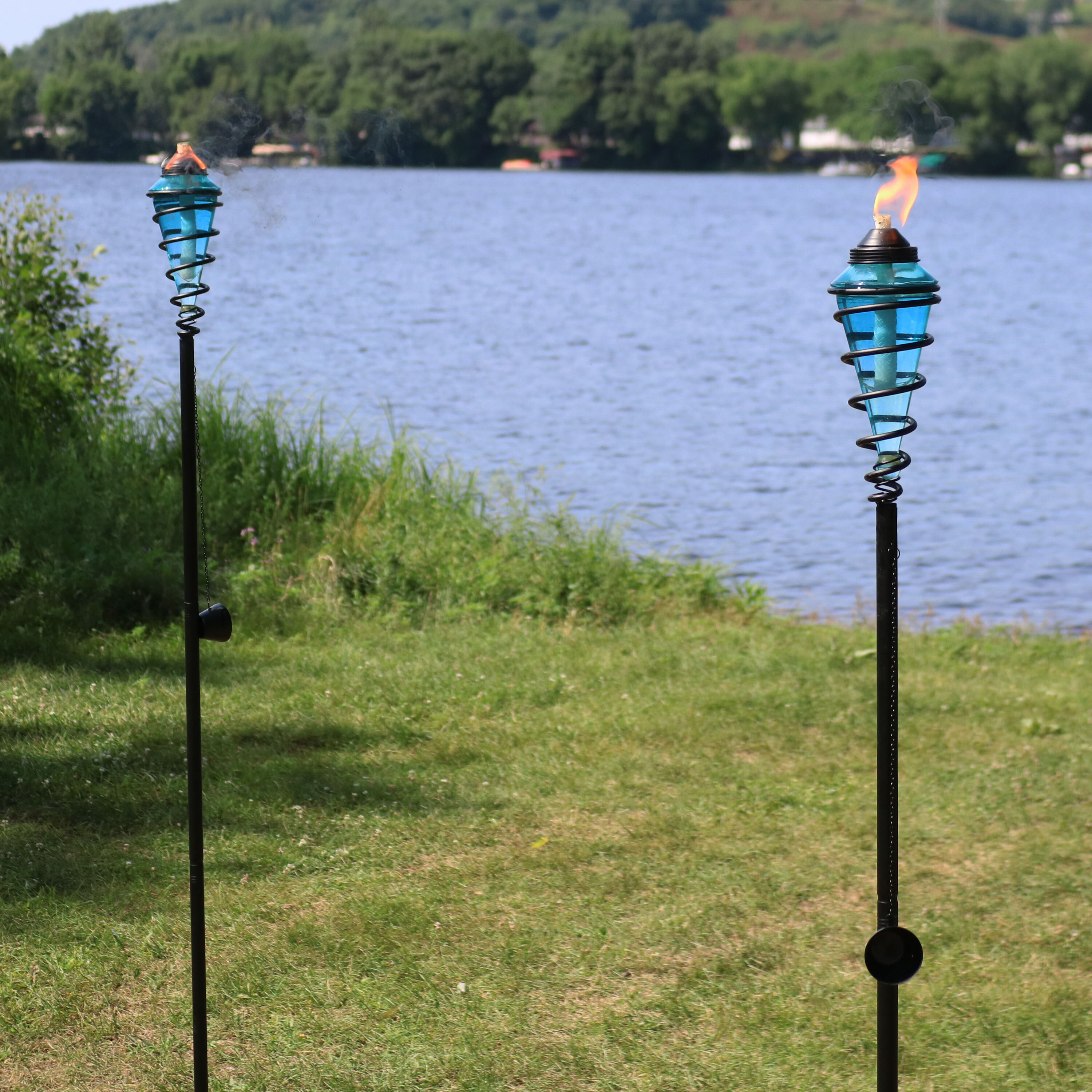 thumbnail video image 2 of Sunnydaze Adjustable Height Metal Swirl Glass Outdoor Lawn Patio Torch - Blue - Set of 2, 2 of 12