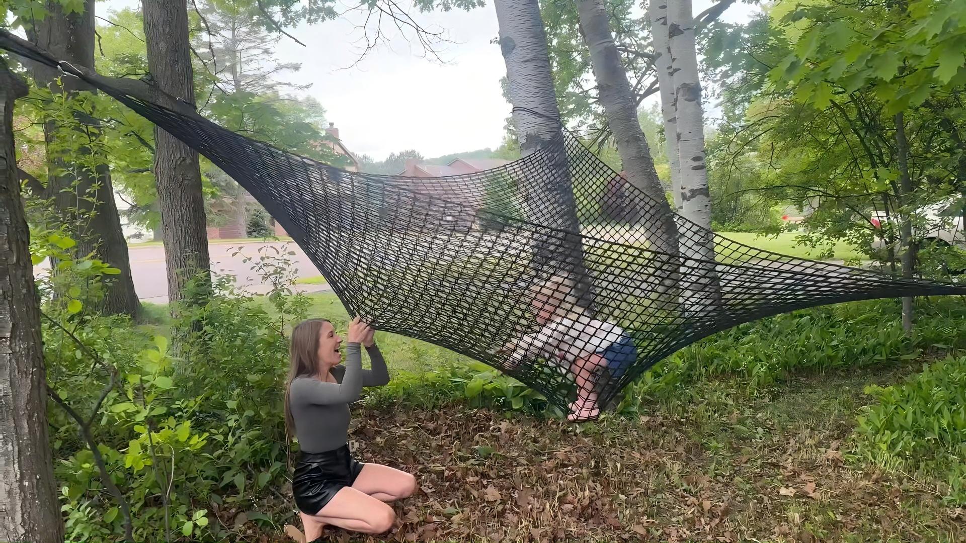 thumbnail video image 2 of JumpTrzz Climbing Net for Kids - 9.9FT x 6.6FT Double Layer Heavy Duty Playground Climbing Cargo Net, Safety Mesh for Tree House & Back Yard (Rainbow), 2 of 8