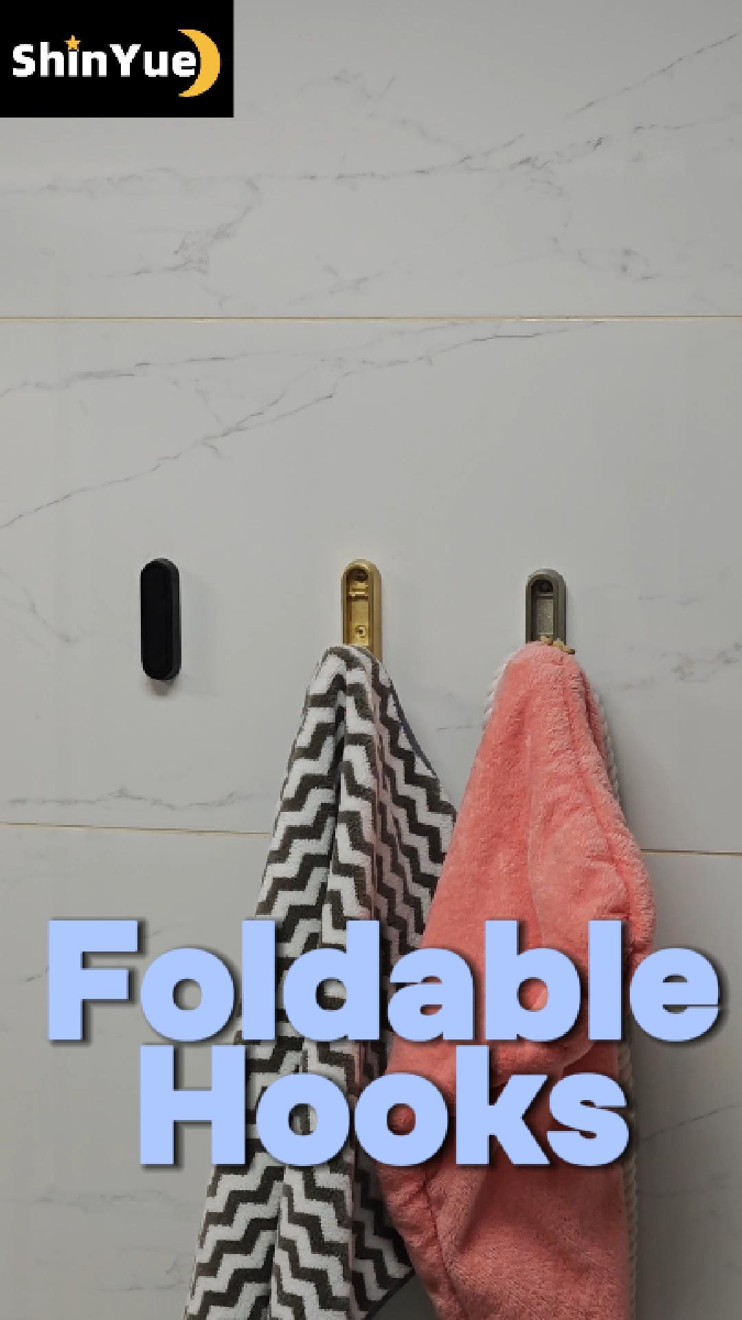 thumbnail video image 2 of ShinYue Foldable Wall Hooks (4 Pack, White) - Zinc Alloy, 33LB Heavy Duty, Space Saving for Kitchen/Bathroom/Bedroom - Black/Silver/Gold/White/Grey, 2 of 9