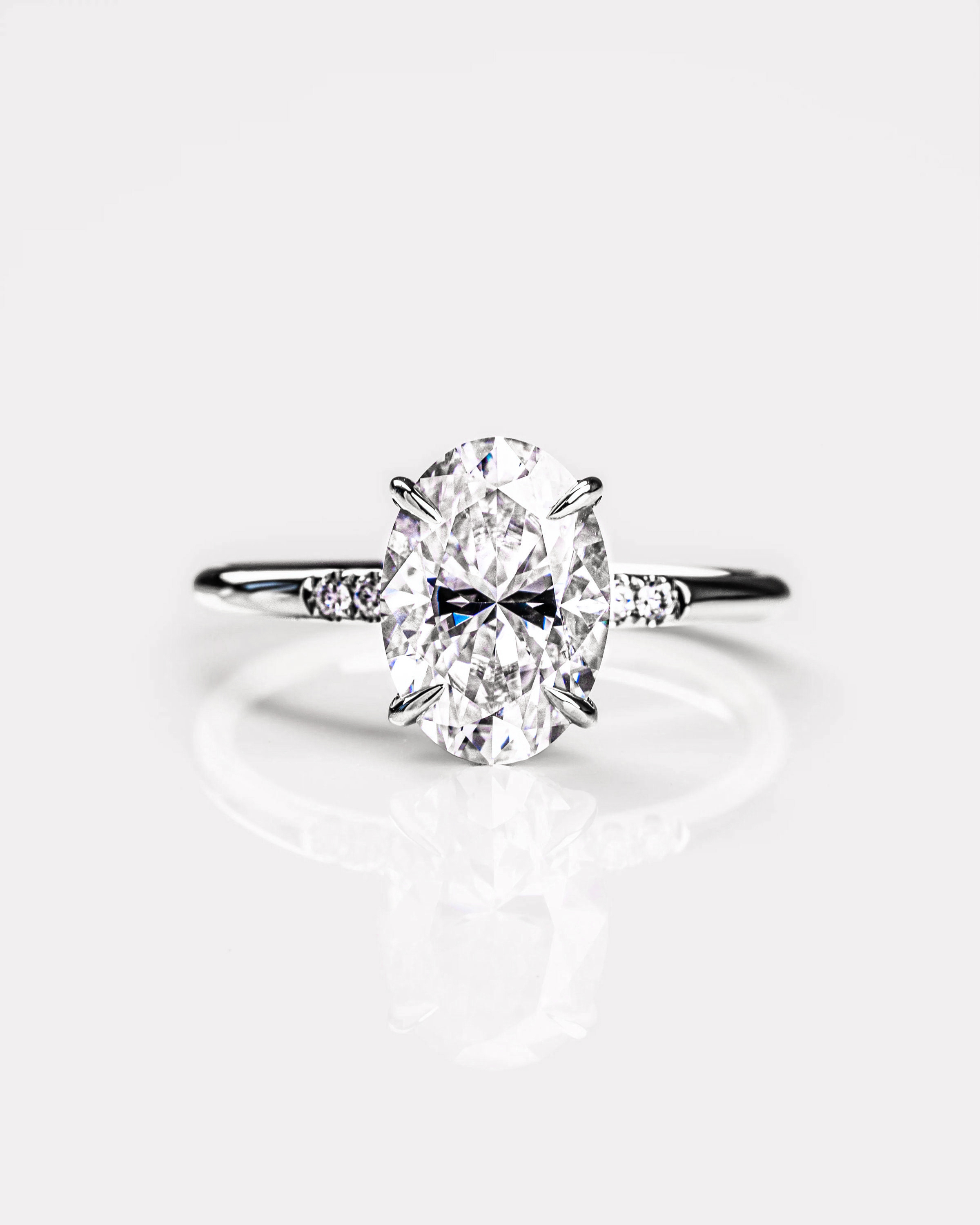 thumbnail video image 2 of solitaire jewels 1.7CT Oval Moissanit Hidden Halo Engagement Ring For Women, 14K Yellow Gold, 2 of 9