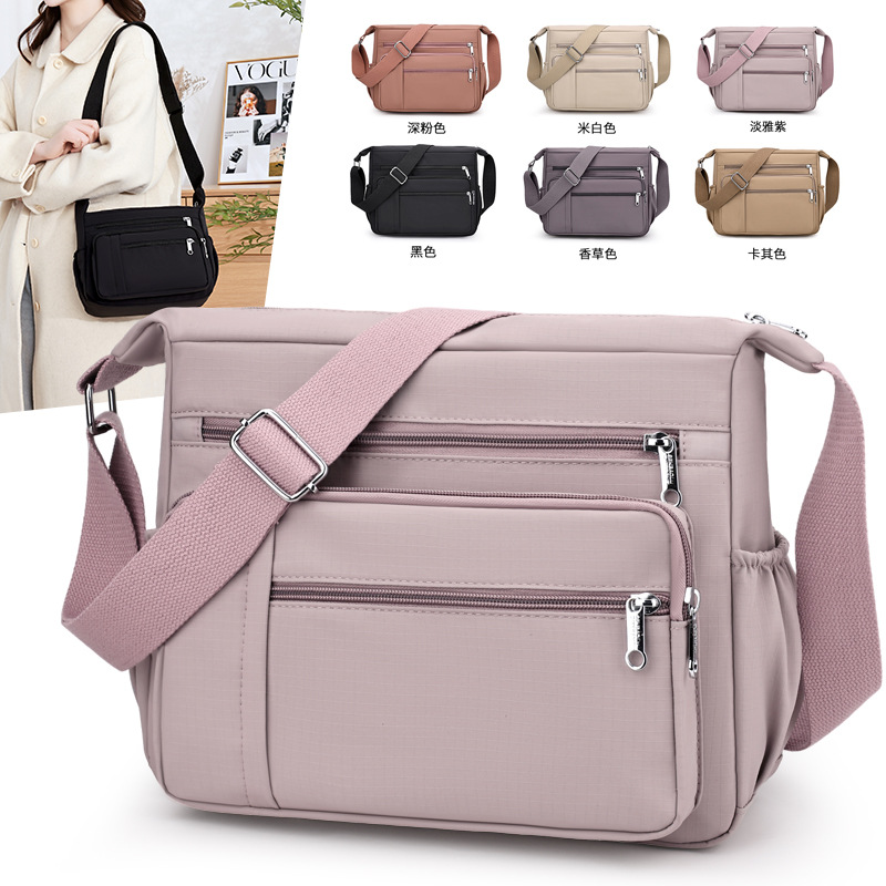 thumbnail video image 2 of Sunyuer Multi-Pocket Waterproof Nylon Crossbody Bag for Women, Lightweight Adjustable Strap Shoulder Messenger Bag Large Capacity Daily Purse for Travel Shopping Work, 2 of 8