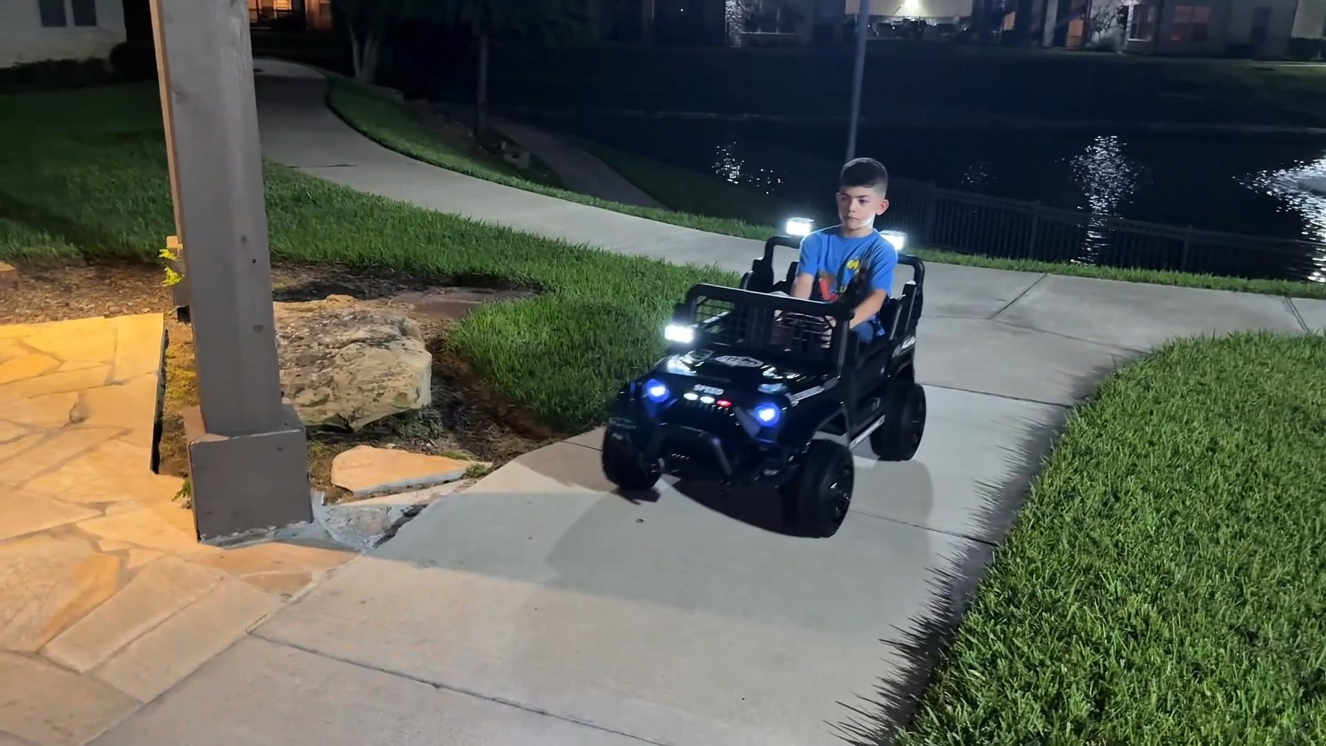 thumbnail video image 2 of YunTopKids 24 Volt Ride on Toys, 2 Seater Power-Wheels, Electric Car for Kids with 800W Powerful Motors, 3 Speeds, LED Lights, Bluetooth Music, Black, 2 of 9