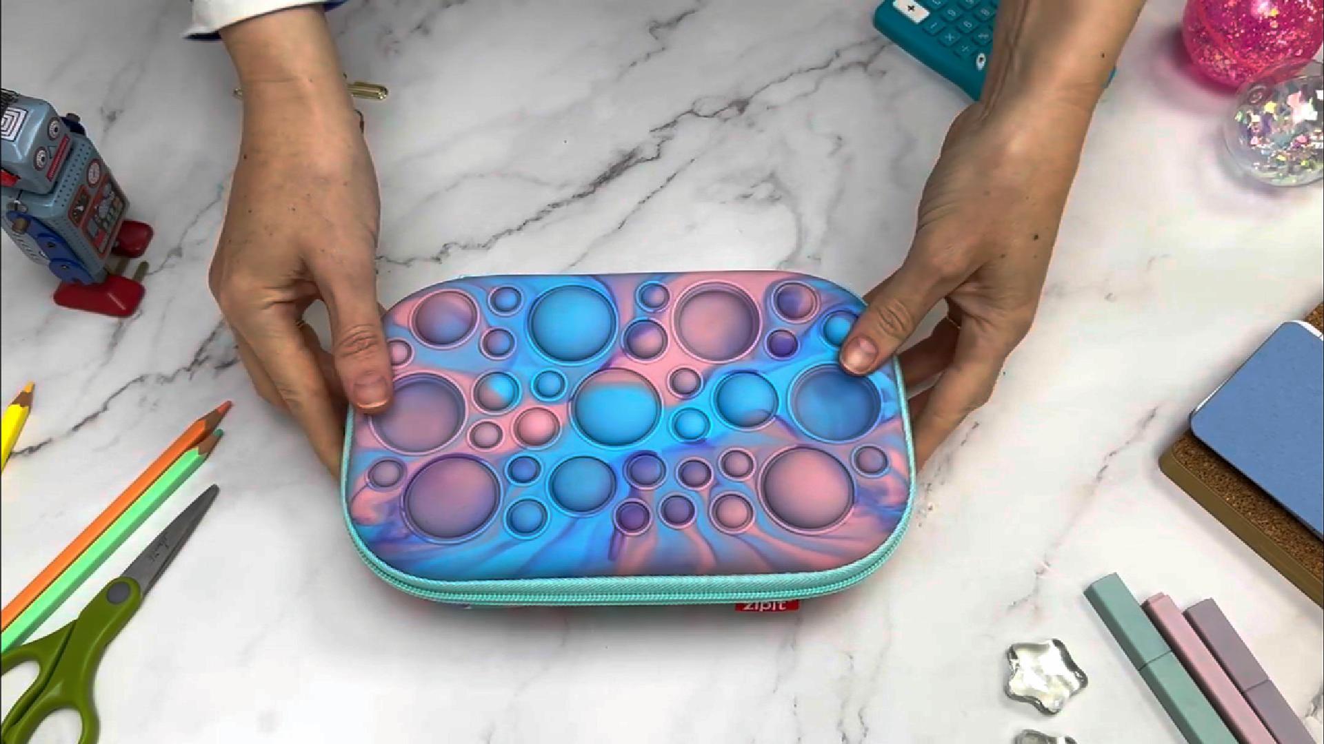thumbnail video image 2 of ZIPIT Bubble Pencil Box for Girls | Fidget Case | Silicon Sensory Push It Case | Large Capacity Pencil Case (Teal Purple), 2 of 9