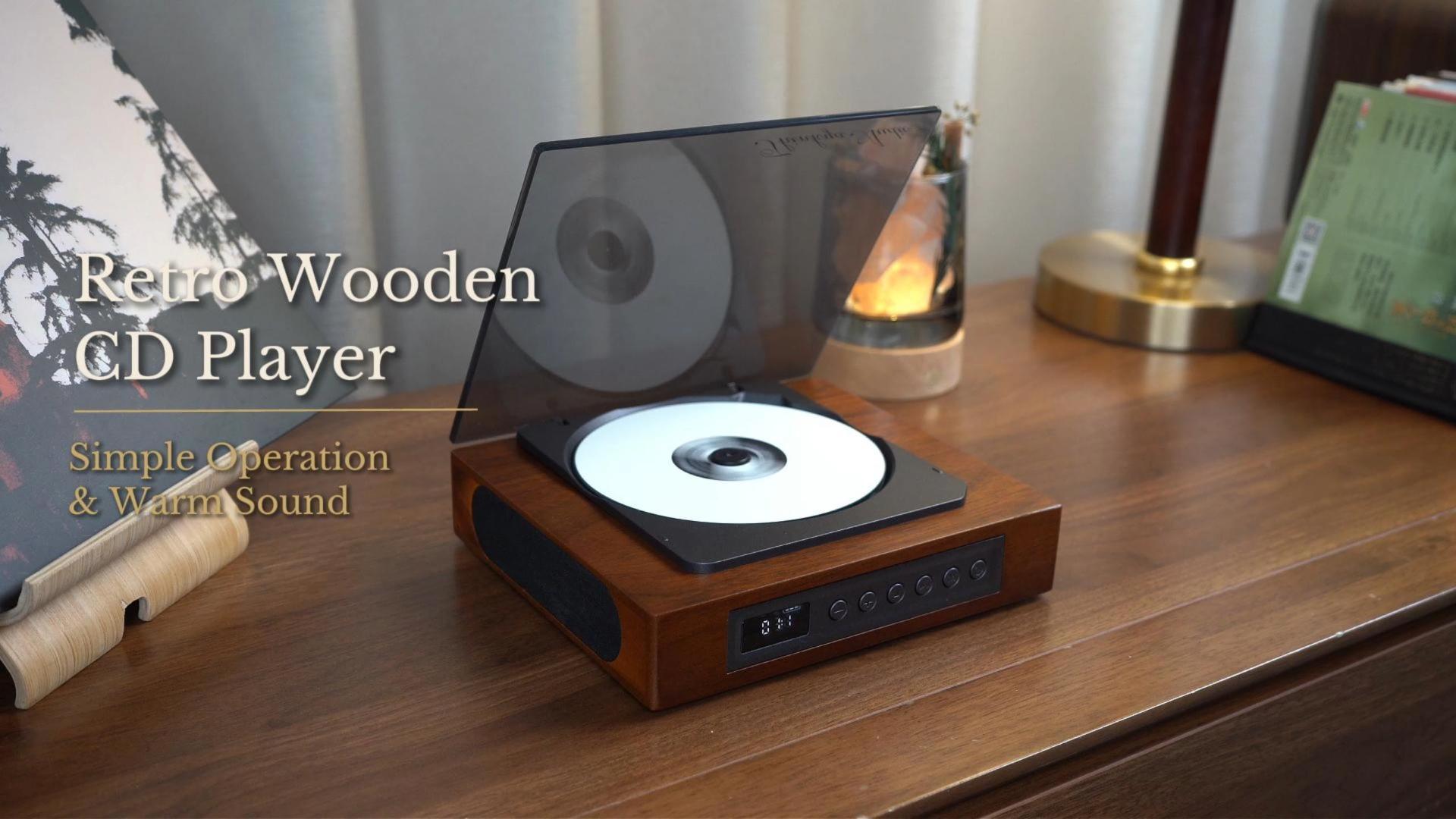 thumbnail video image 2 of THINKYA DVP-560 Retro CD Player for Home, Wooden Desktop CD Player with Built-in Dual Speakers, Bluetooth 5.3 Transmitter & Receiver, USB/SD Playback, AUX & SPDIF Output, Rechargeable, Remote Control, 2 of 14