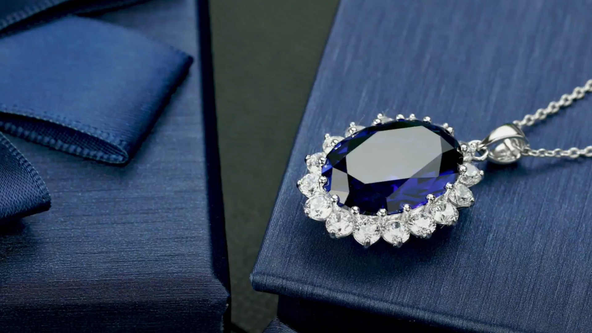 thumbnail video image 2 of Gem Stone King 13.00 Ct Oval Blue Simulated Sapphire 925 Sterling Silver Pendant with 18" Chain, 2 of 7