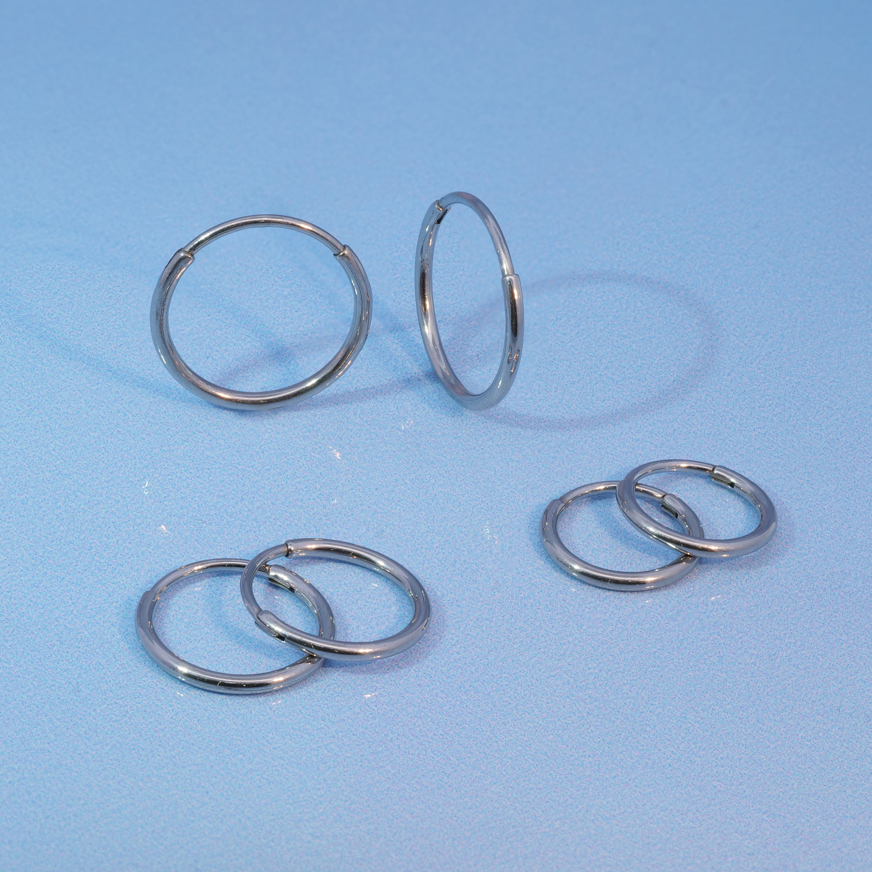 thumbnail video image 2 of Limerencia G23 Titanium Slim Hoop Earrings, Hypoallergenic Nose/Lip Earrings 3Pairs Silver Unisex, 2 of 7