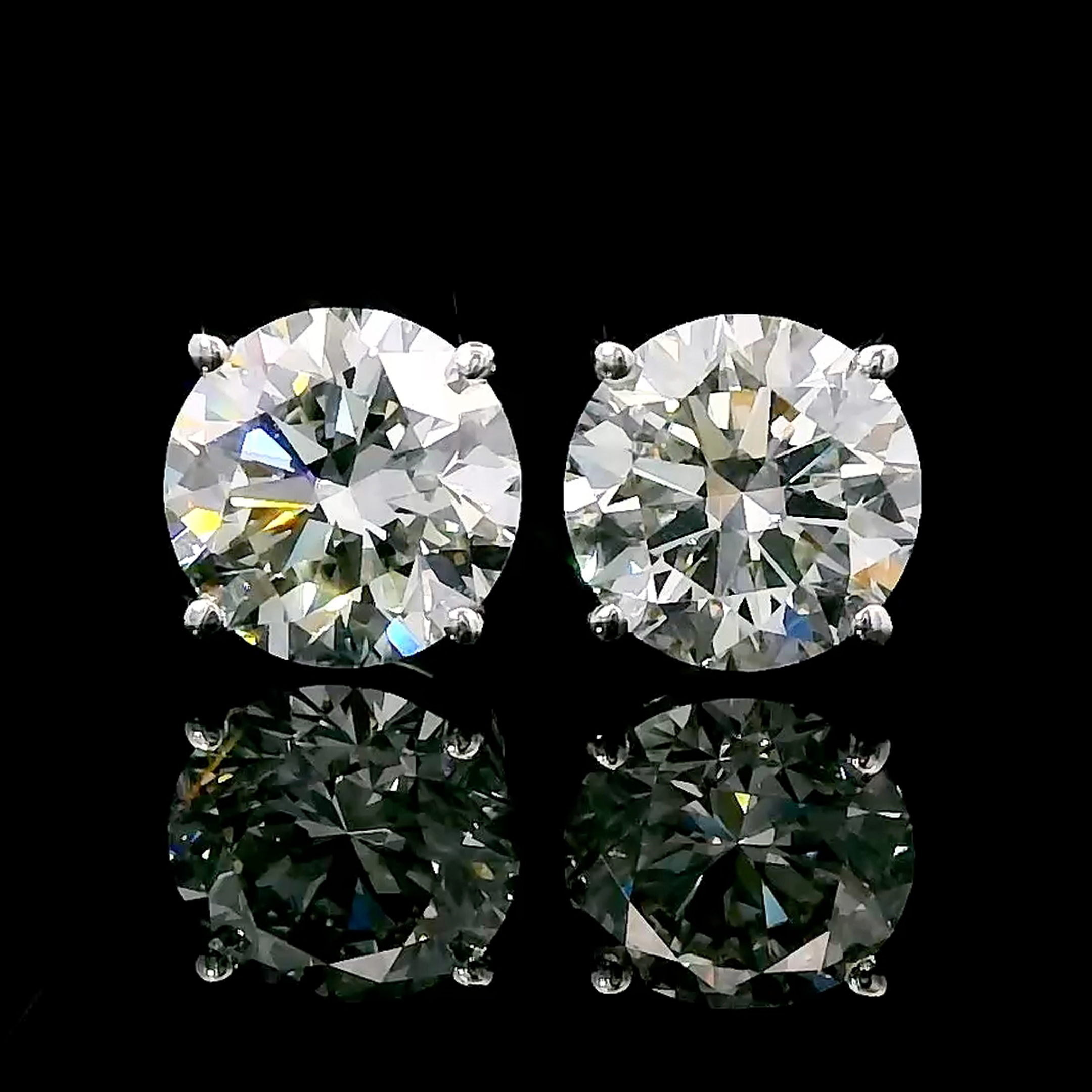 thumbnail video image 2 of Gem Stone King 14K White Gold Lab Grown Diamond Stud Earrings for Women Men (1.40 Cttw, E-F Color, VS1-VS2 Clarity), 2 of 7
