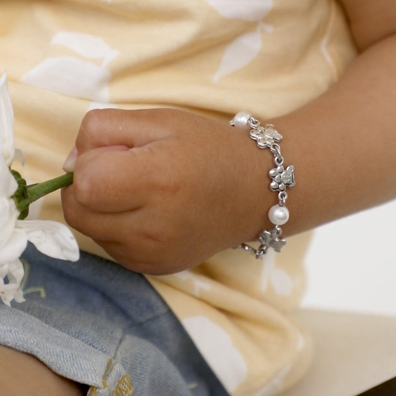 thumbnail video image 2 of 925 Sterling Silver 4.5" Teddy Bear & Simulated Pearl Bracelet for Baby Girls, 2 of 6