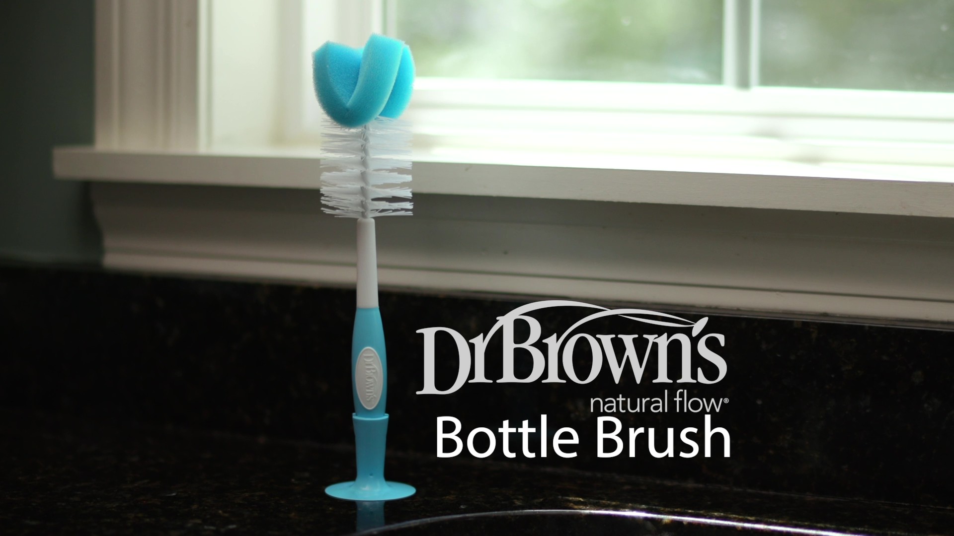 thumbnail video image 2 of Dr. Brown's Baby Bottle Brush with Suction Cup Stand, Sponge, Scrubber and Nipple Cleaner Blue, 1 Pack, 2 of 10