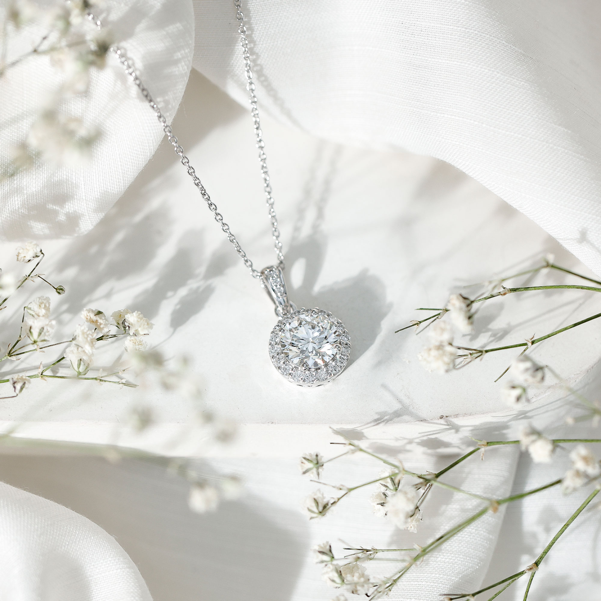 thumbnail video image 2 of Rosec Jewels Certified Moissanite Pendant Necklace with Halo - 8mm Round - 2 Carat - D-VS1 Quality - with Jewelry Box, 14K White Gold, 2 of 8