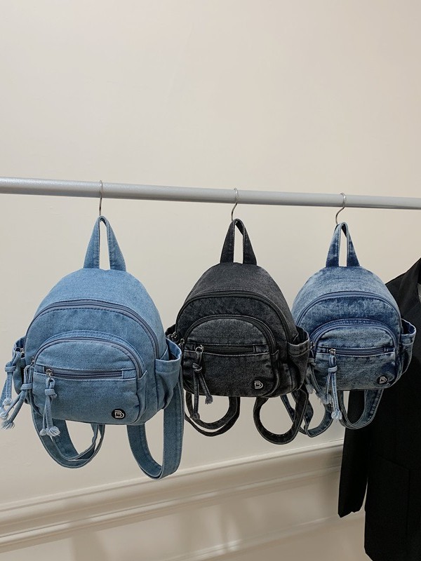thumbnail video image 2 of Sunyuer Vintage Washed Denim Mini Backpack for Women, Casual Small Daypack with Tassel Drawstring Detail, Lightweight Retro Travel Backpack Purse for Daily Shopping Weekend Outing, 2 of 9