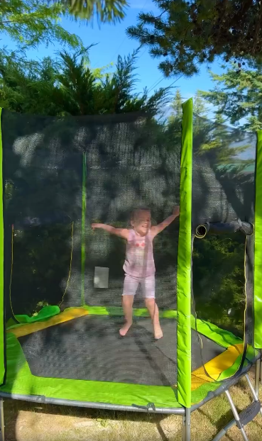 thumbnail video image 2 of 7ft Kids Trampoline with Slide, Small Toddler Trampoline with Ladder for Kids, SEGMART Indoor Outdoor Trampoline with Enclosure Net, Spring Pad for Backyard, 2 of 7