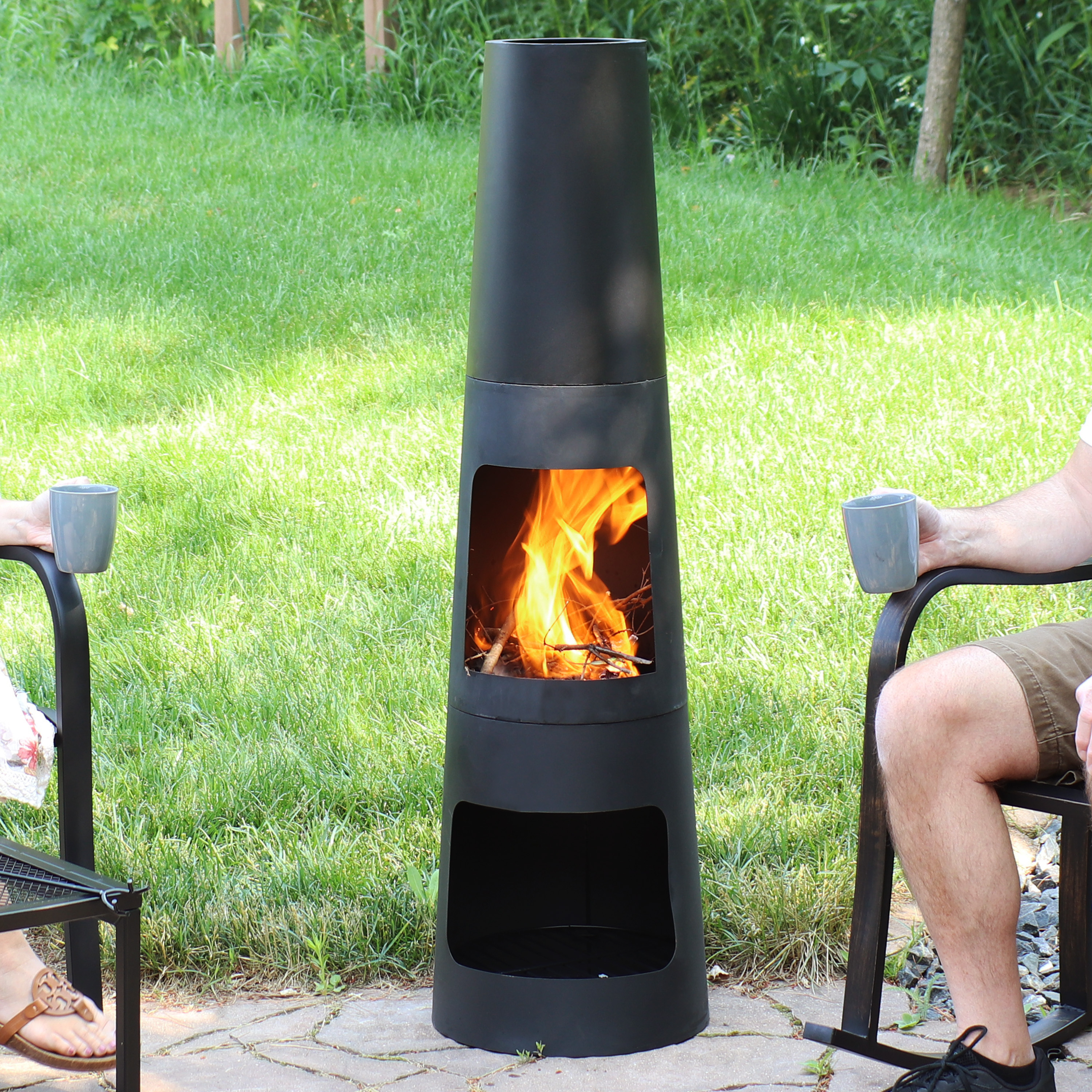 thumbnail video image 2 of Sunnydaze 49" Heavy-Duty Black Finish Steel Wood-Burning Chiminea with Built-In Log Storage, 2 of 11