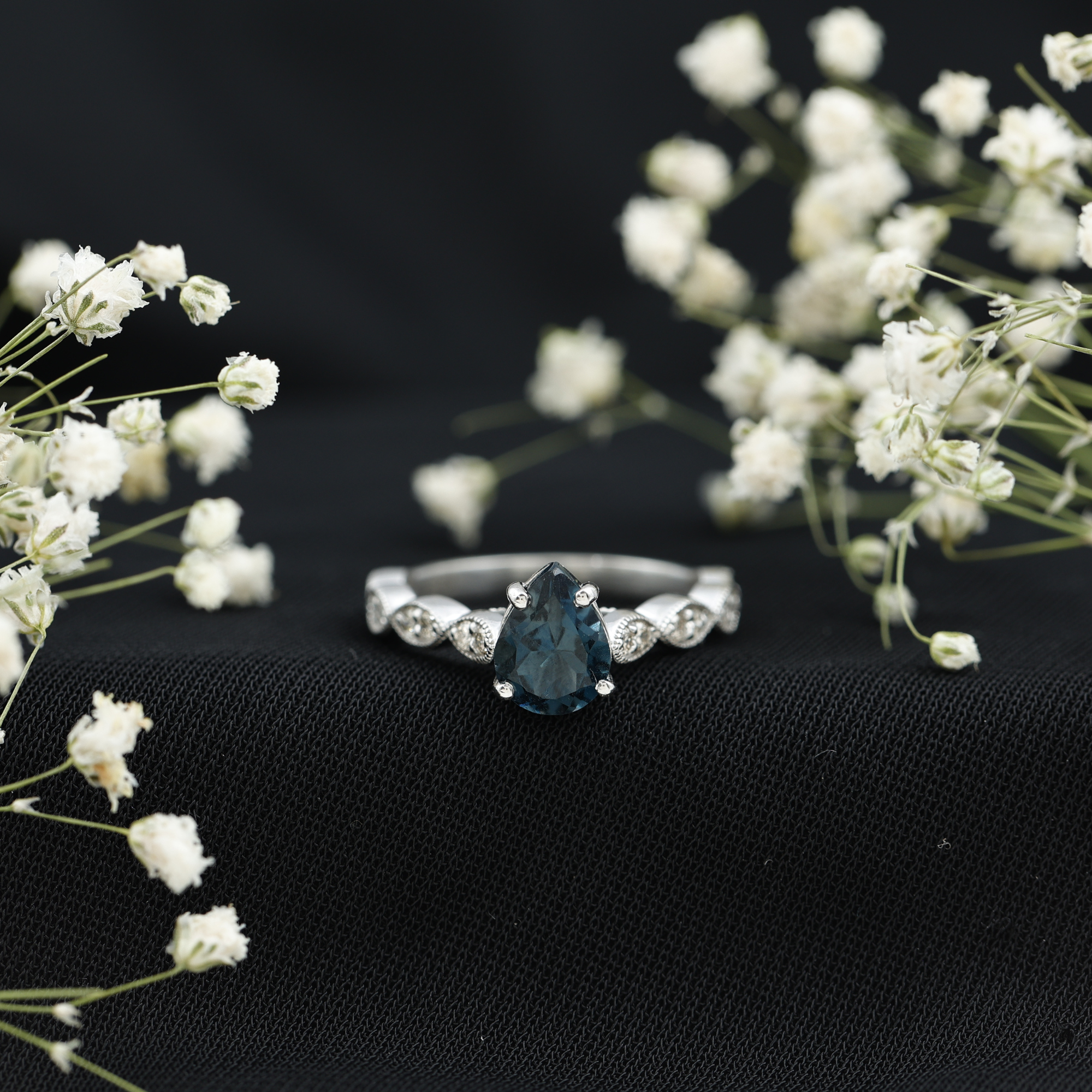 thumbnail video image 2 of Rosec Jewels London Blue Topaz Teardrop Engagement Ring with Side Stones - 6X8 mm - Blue Topaz Diamond Ring - AAA Quality, 10K Yellow Gold, US 8.50, 2 of 9