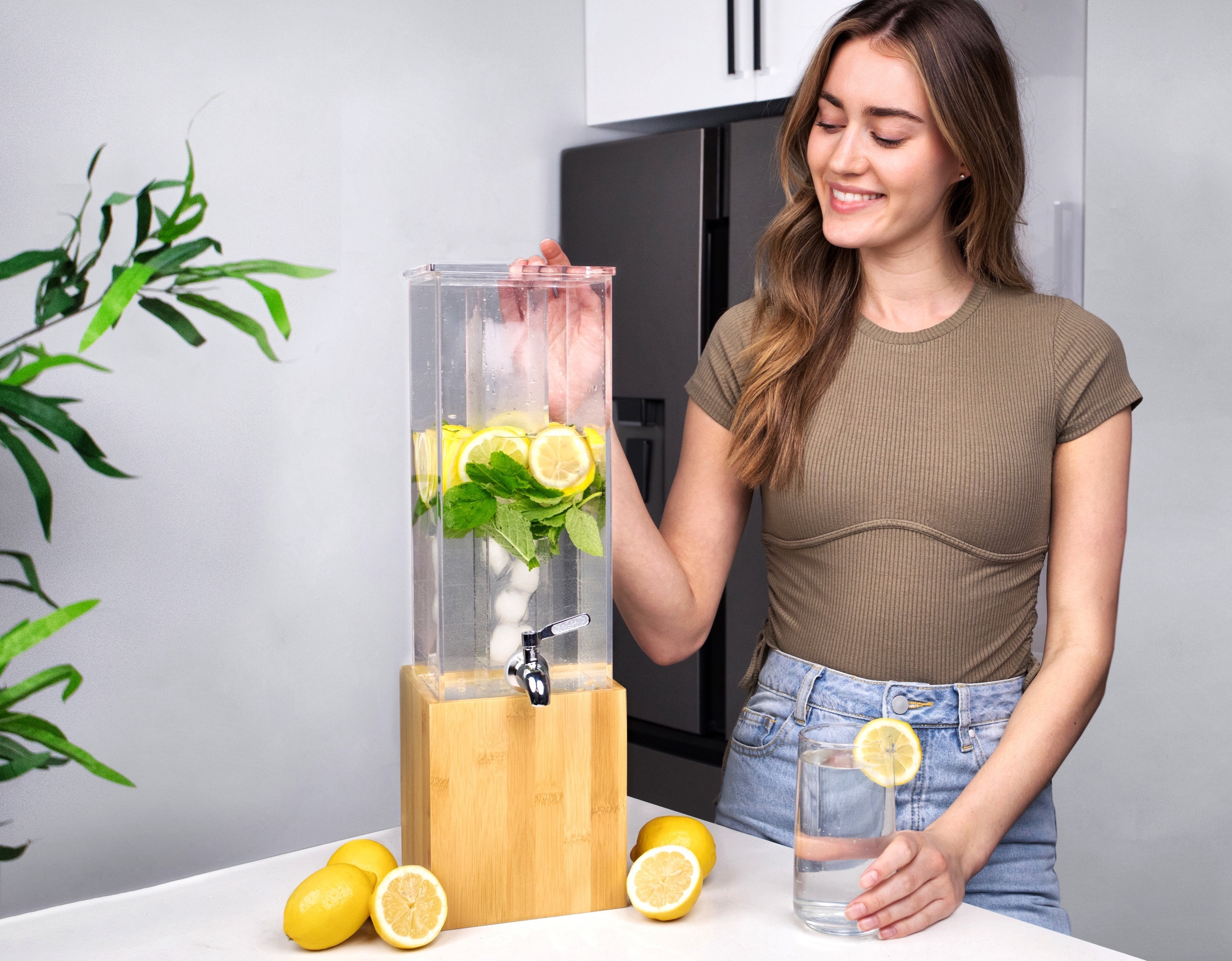 thumbnail video image 2 of Ksestor Acrylic Drink Dispenser with Ice Core, Bamboo Stand & Steel Spigot – 1.25 Gallon Leak-Proof Beverage Dispenser, 2 of 7