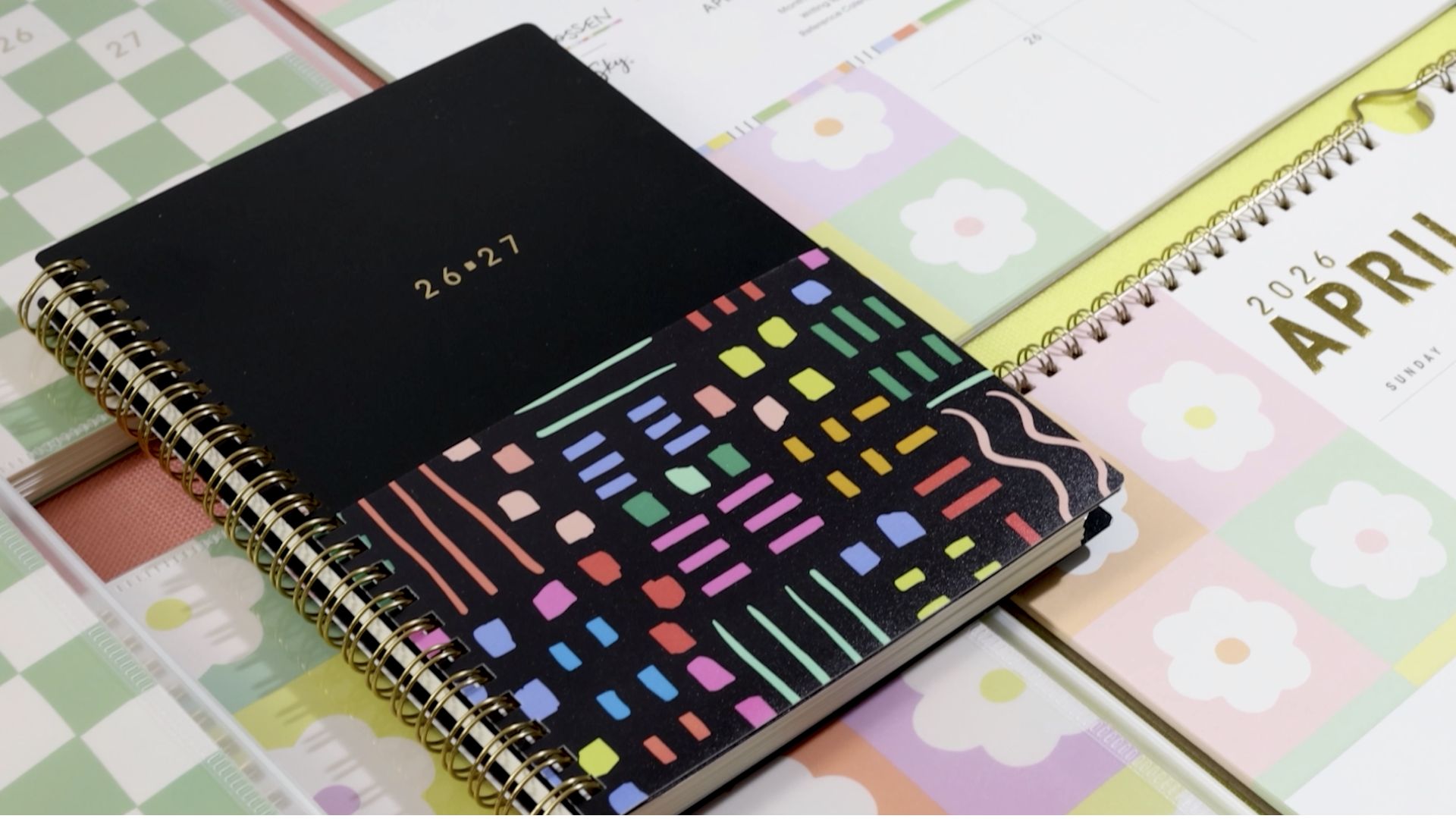 thumbnail video image 2 of Blue Sky Brook Gossen 15 Month 2026-2027 Weekly and Monthly Academic Year Planner Calendar, April 2026 - June 2027, 5" x 8", Flexible Cover With Zip Pouch, Wirebound, Storage Pocket, Green Check, 2 of 10