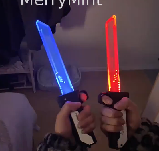 thumbnail video image 2 of Double-Edged Retractable LED Sword with Motion Sound & Steam Effect - St. Patrick's Day Green & Multi-Color Modes for Cosplay, Teens & Adults, 2 of 10