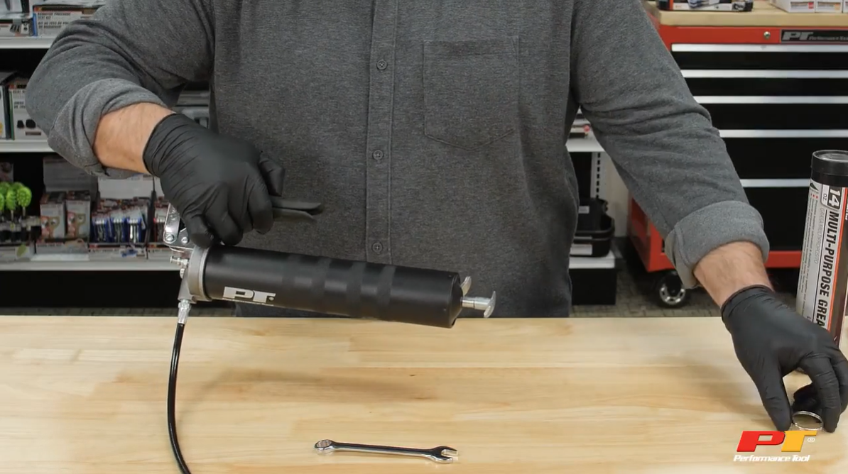 thumbnail video image 2 of Performance Tool W54291 Lightweight Pistol Grip Grease Gun with Anodized Aluminum Barrel, T-Handle, and 4-Jaw Coupler, Accepts 14 oz Cartridges, 2 of 10