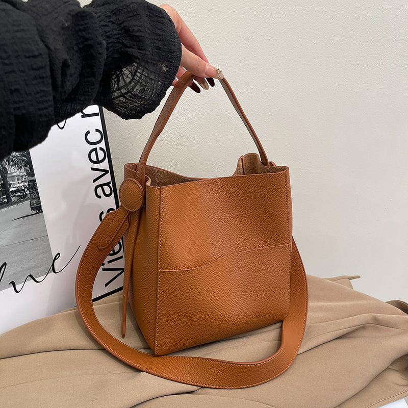 thumbnail video image 2 of SPEKSEE Women PU Leather Bucket Bag, Vintage Shoulder Handbag, Large Capacity Commuter Tote Purse, Detachable Wide Strap Crossbody Bag for Work, 2 of 9
