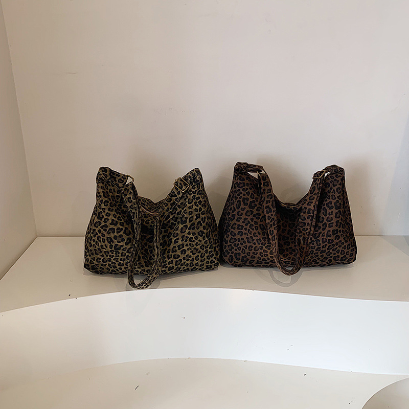 thumbnail video image 2 of SPEKSEE Women Vintage Leopard Print Canvas Hobo Bag, Large Capacity Adjustable Strap Crossbody Tote Bag, Casual Shoulder Commuter Bag, 2 of 8