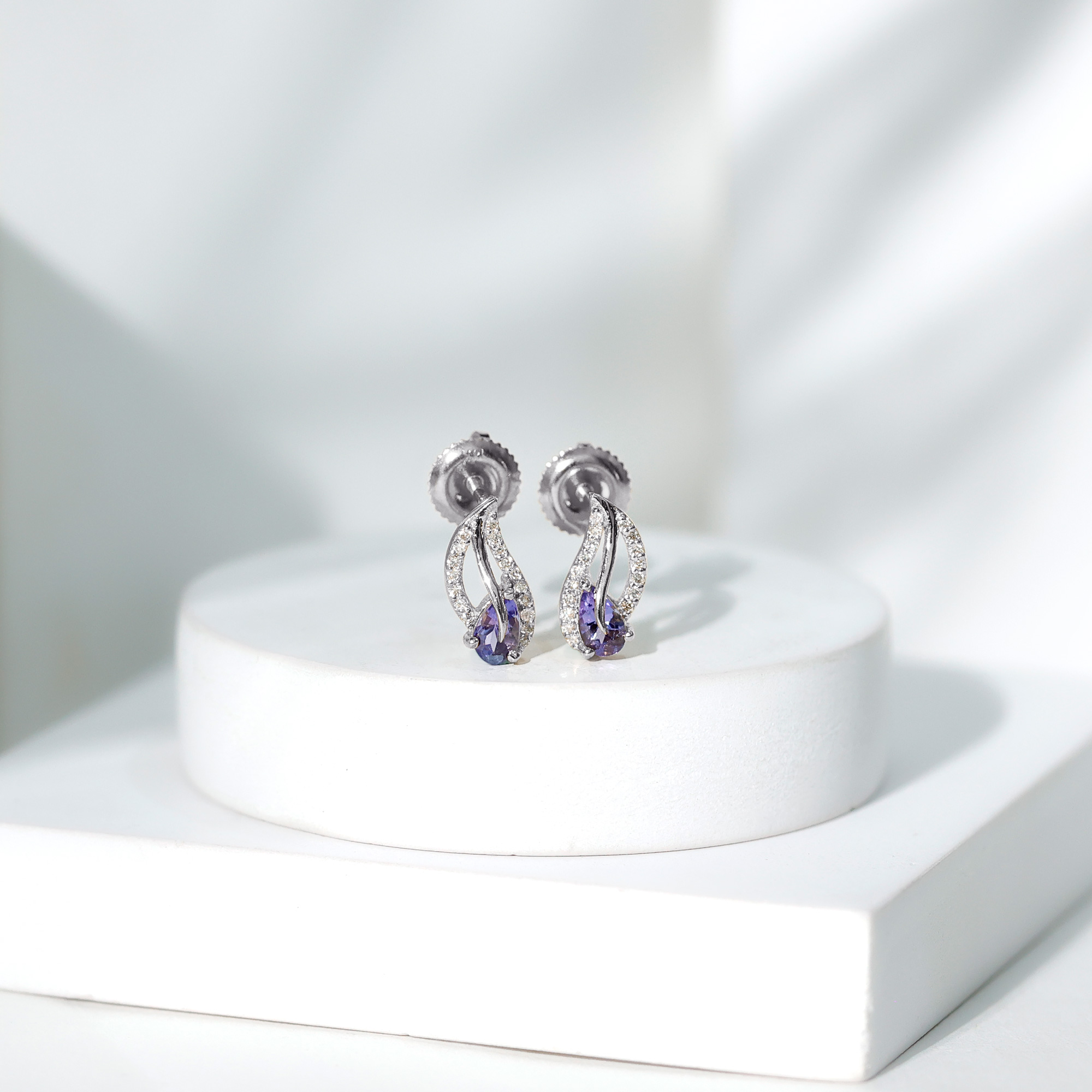 thumbnail video image 2 of Rosec Jewels 0.75 CT Tanzanite Leaf Stud Earrings with Diamond for Women (AAA Quality), 14K White Gold, 2 of 7