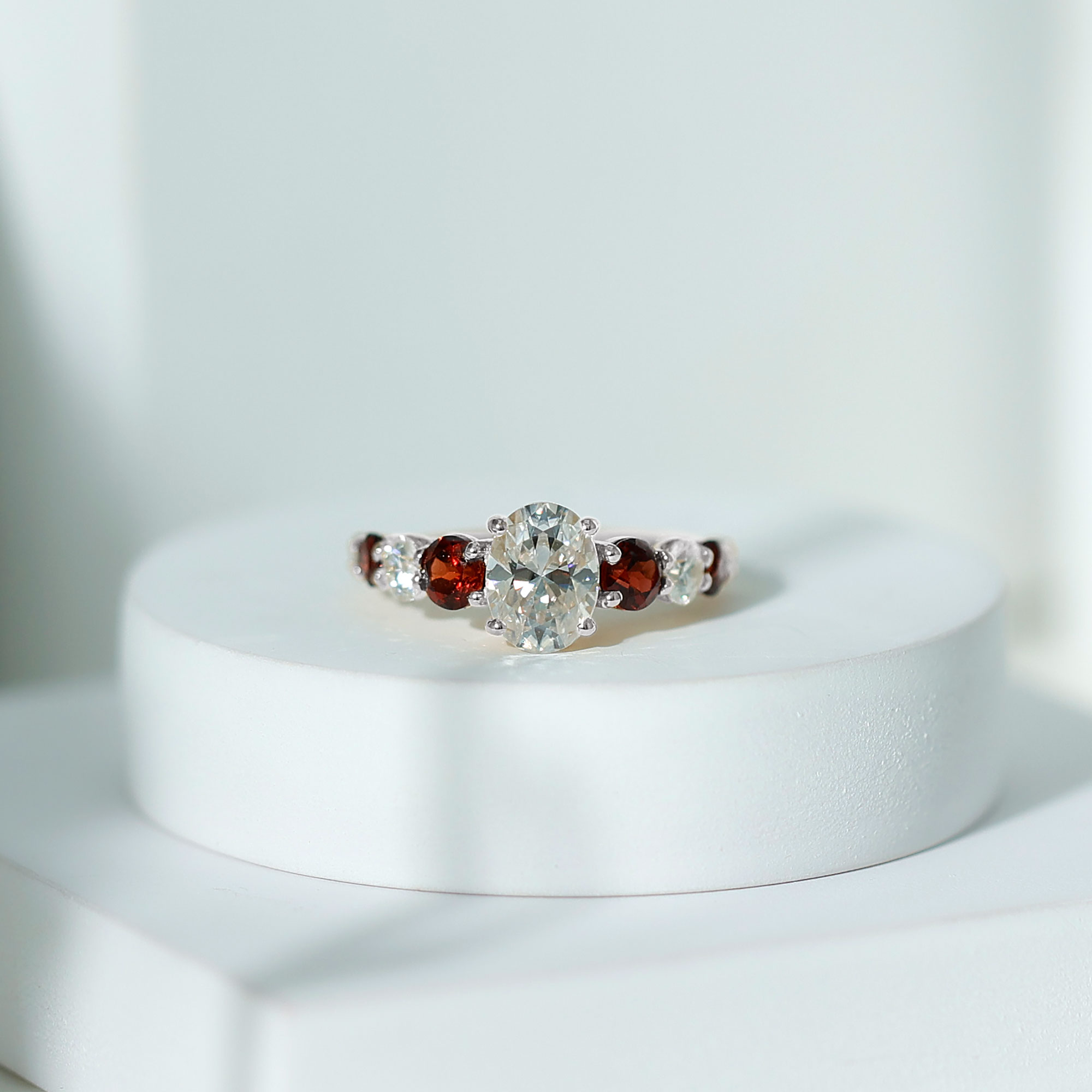 thumbnail video image 2 of Rosec Jewels Oval Moissanite Engagement Ring with Garnet for Women - 6X8 mm - D-VS1 Grade, 14K White Gold, US 9.50, 2 of 7