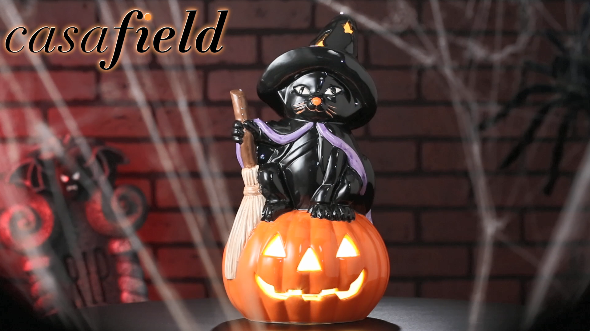 thumbnail video image 2 of Pre-Lit Ceramic Halloween Black Cat on Pumpkin Hand-Painted Tabletop Decor, 2 of 7