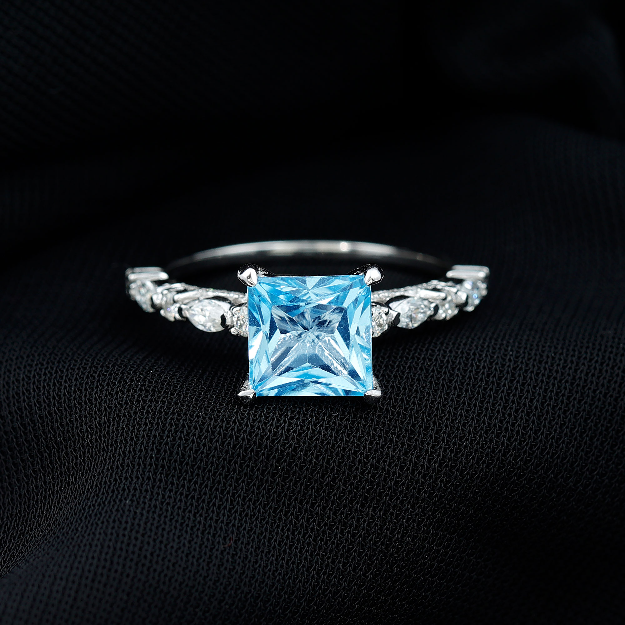 thumbnail video image 2 of Rosec Jewels Princess Cut Sky Blue Topaz Solitaire Ring for Women with Moissanite, 925 Sterling Silver, US 4.00, 2 of 9