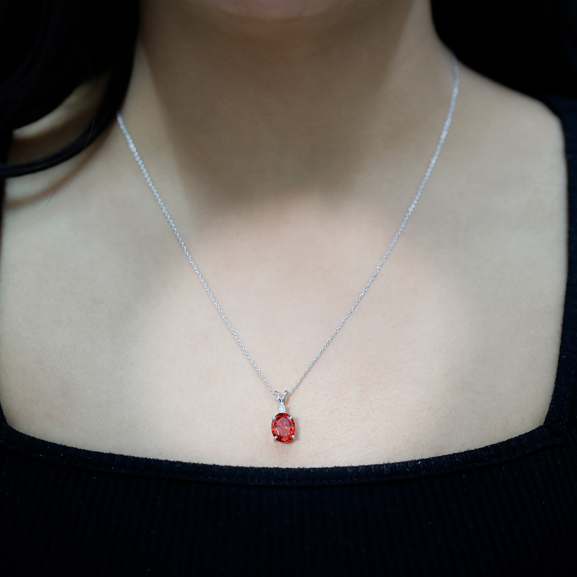 thumbnail video image 2 of Rosec Jewels Lab Grown Orange Sapphire Solitaire Pendant with Moissanite (8X10 mm Oval Shape), 18K White Gold, 2 of 8