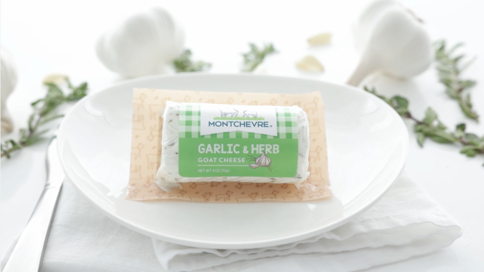 thumbnail video image 2 of Montchevre Garlic and Herbs Goat Refrigerated Plastic Wrapped Cheese Log 4 oz, 2 of 12