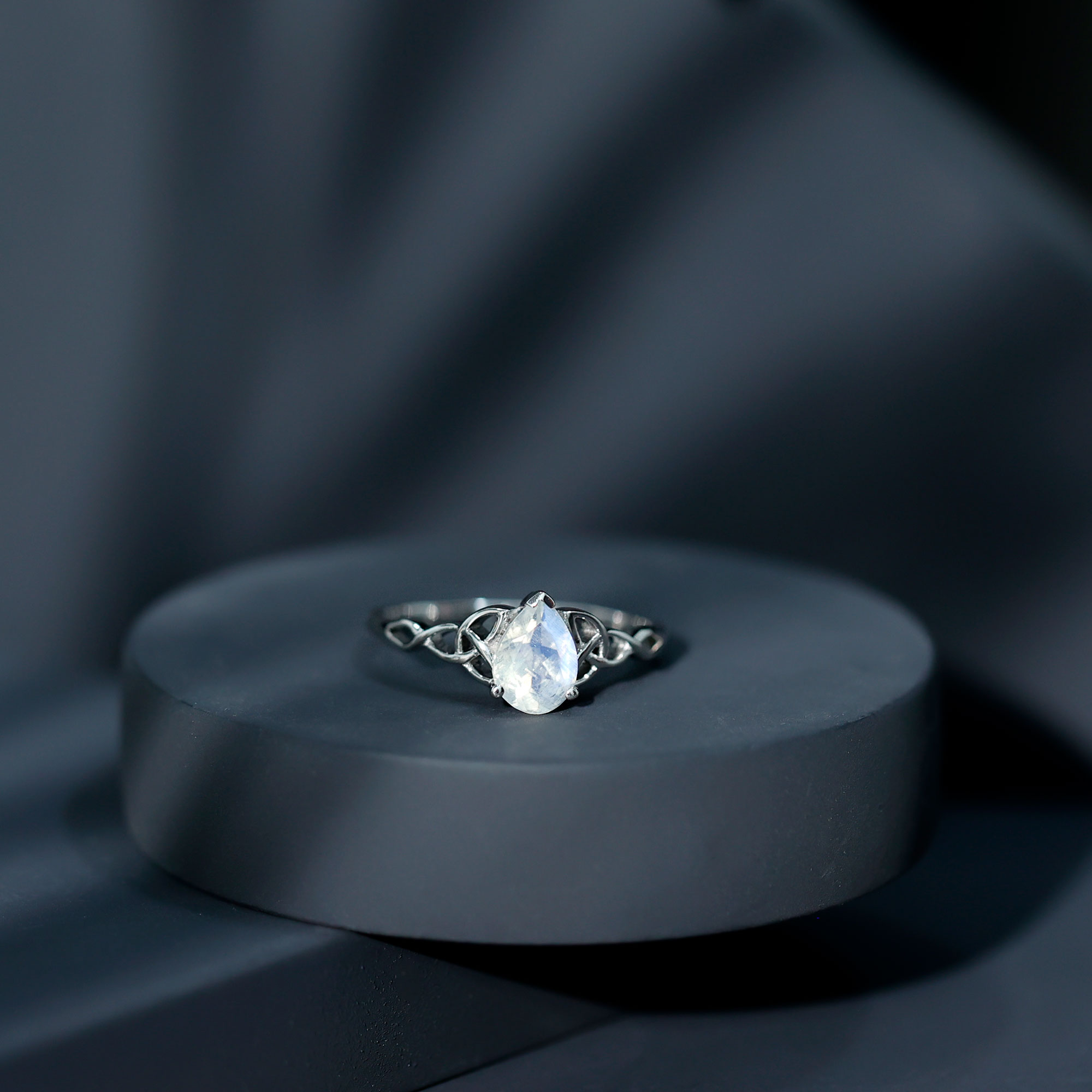 thumbnail video image 2 of Rosec Jewels Solitaire Moonstone Celtic Knot Ring for Women (5X7 mm Pear Shape) - AAA Quality, 18K Yellow Gold, US 5.50, 2 of 9