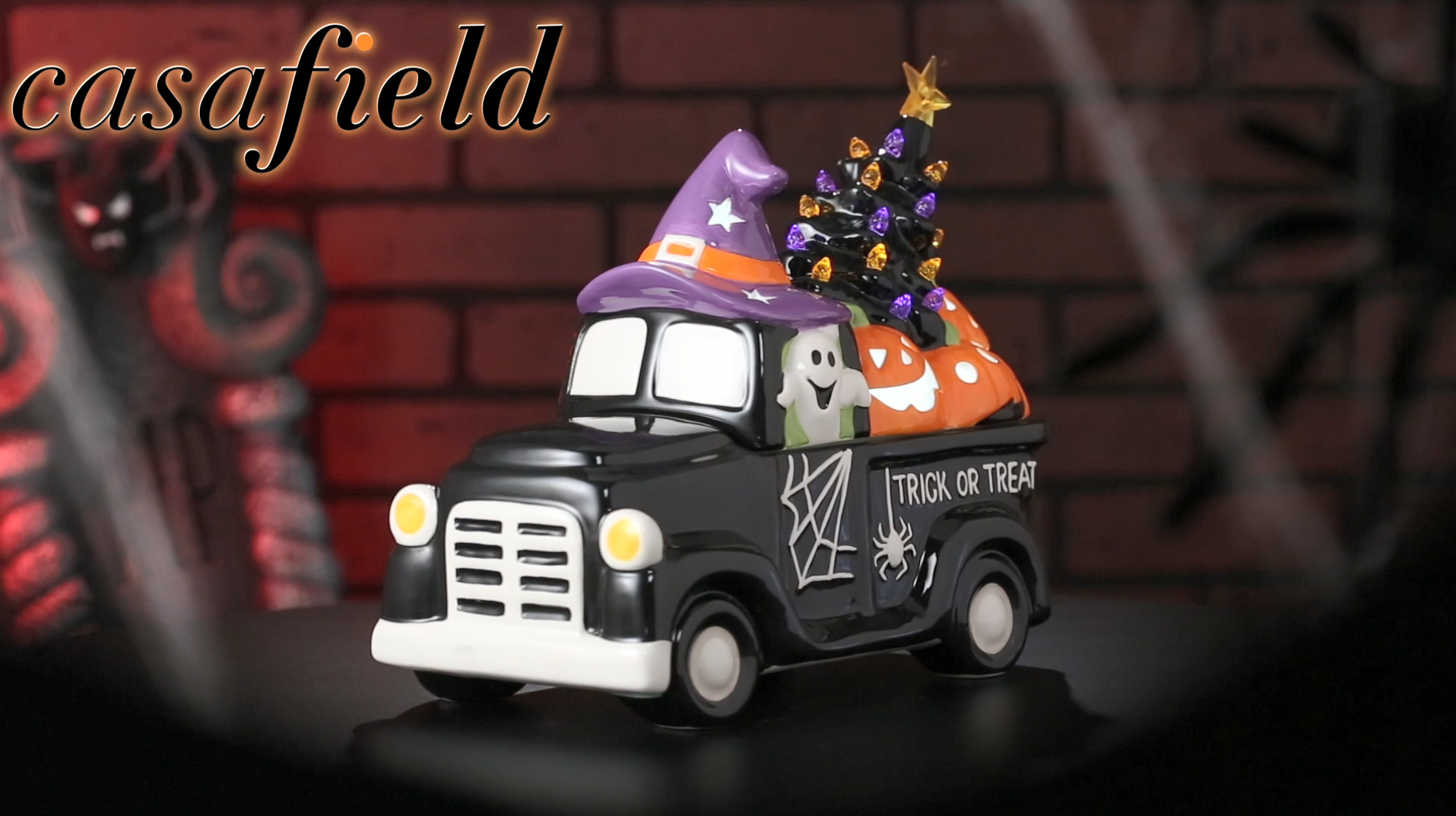 thumbnail video image 2 of Pre-Lit Ceramic Halloween Truck with Pumpkin Hand-Painted Tabletop Decor, 2 of 7