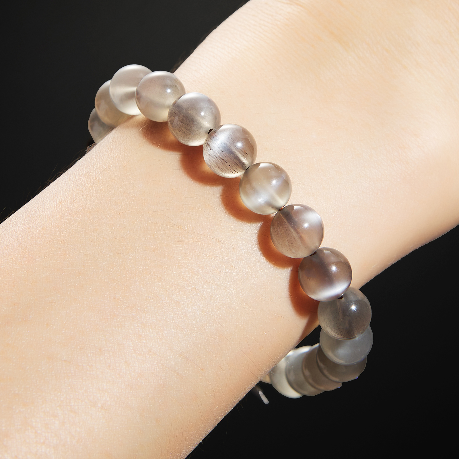 thumbnail video image 2 of Flyshop Jewelry Natural Black Moonlight Stone Bracelet, Sun Stone, Black Backbone Crystal Jewelry, Women's Bracelet (Bead Dia. 10 mm), 2 of 11